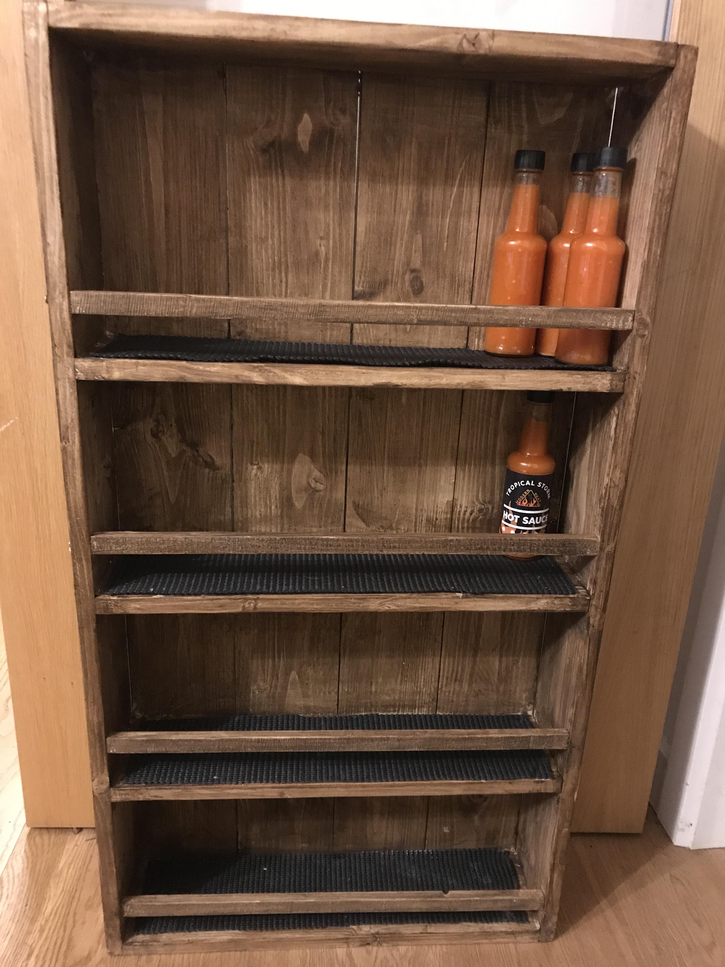 Been seeing a lot of people’s hot sauce shelves, I raise you a shelf I