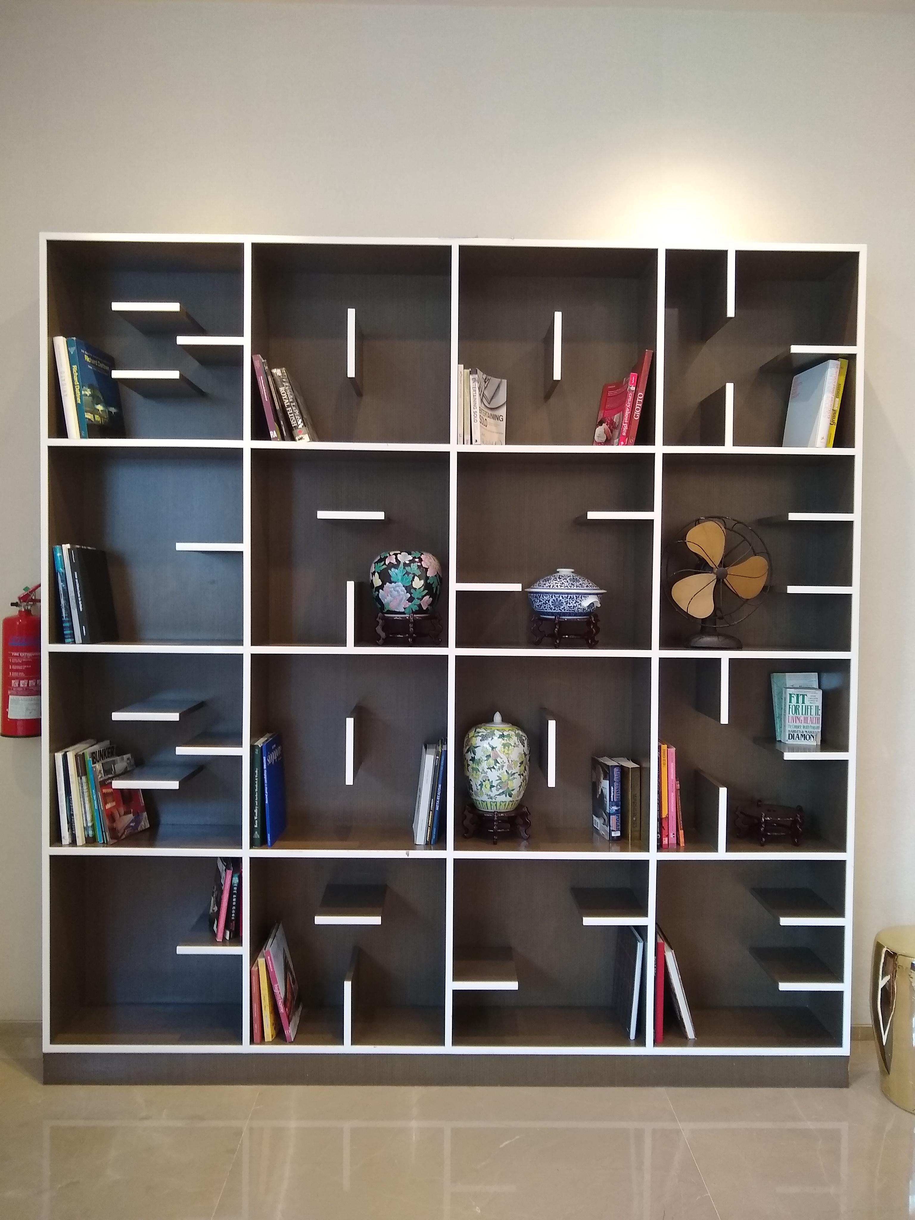 This bookcase that spells 'bookcase' with its shelves. r