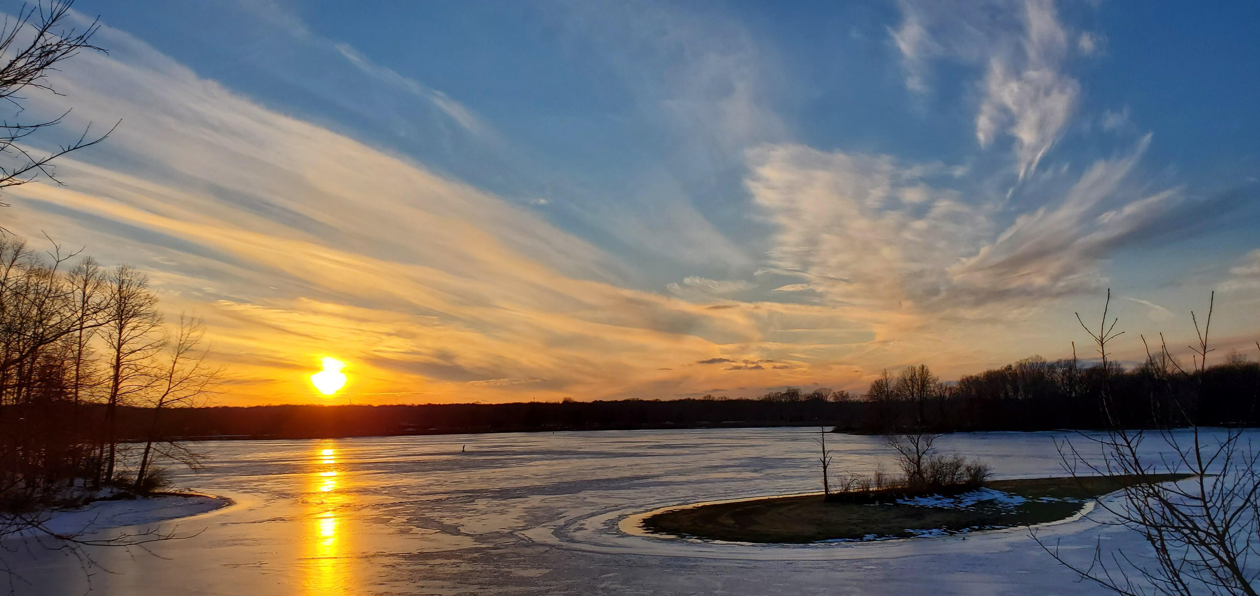 Late Winter sunset over frozen Nimisila Reservoir Akron Ohio February
