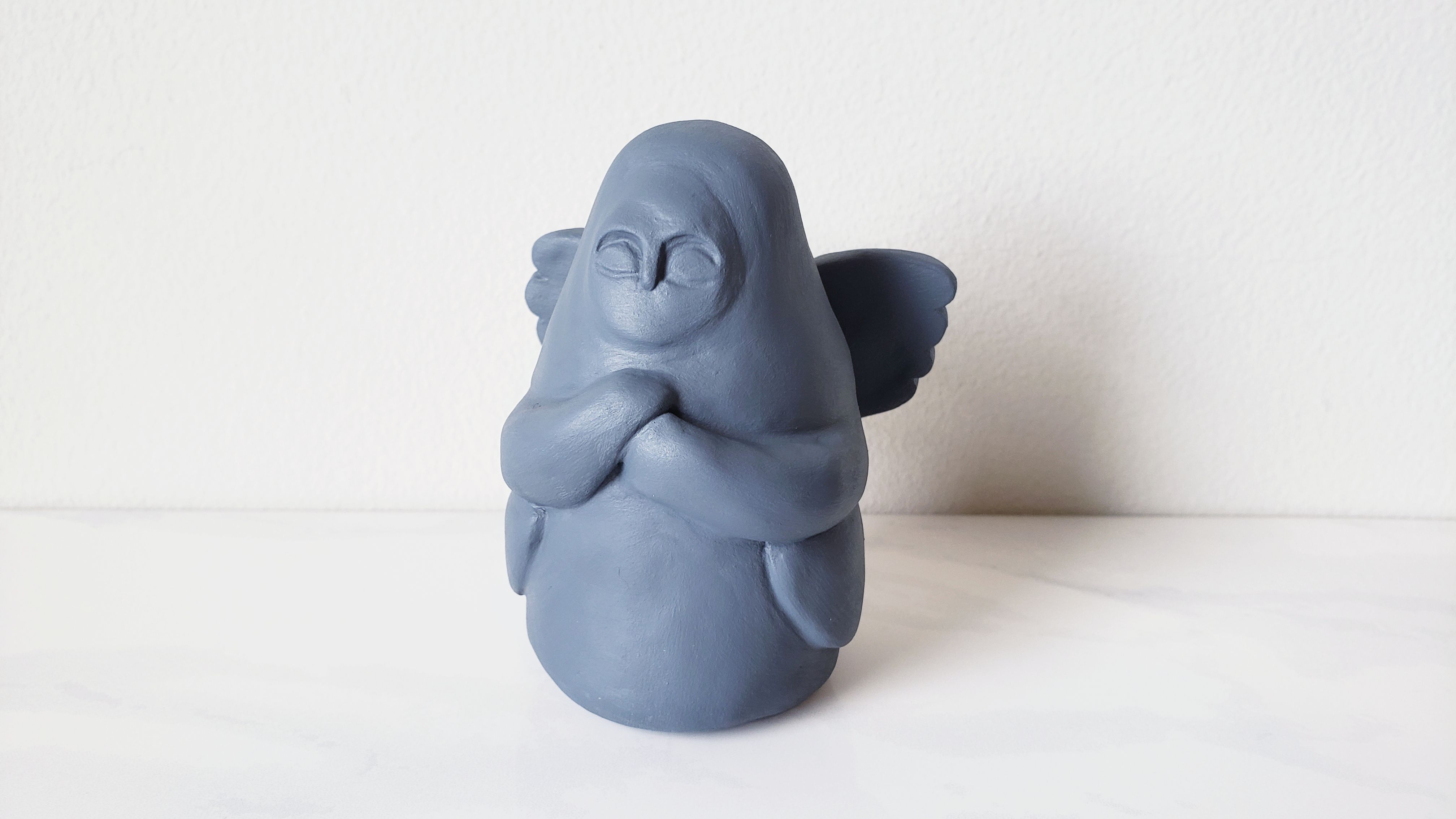 My version of a BOTW goddess statue r/polymerclay