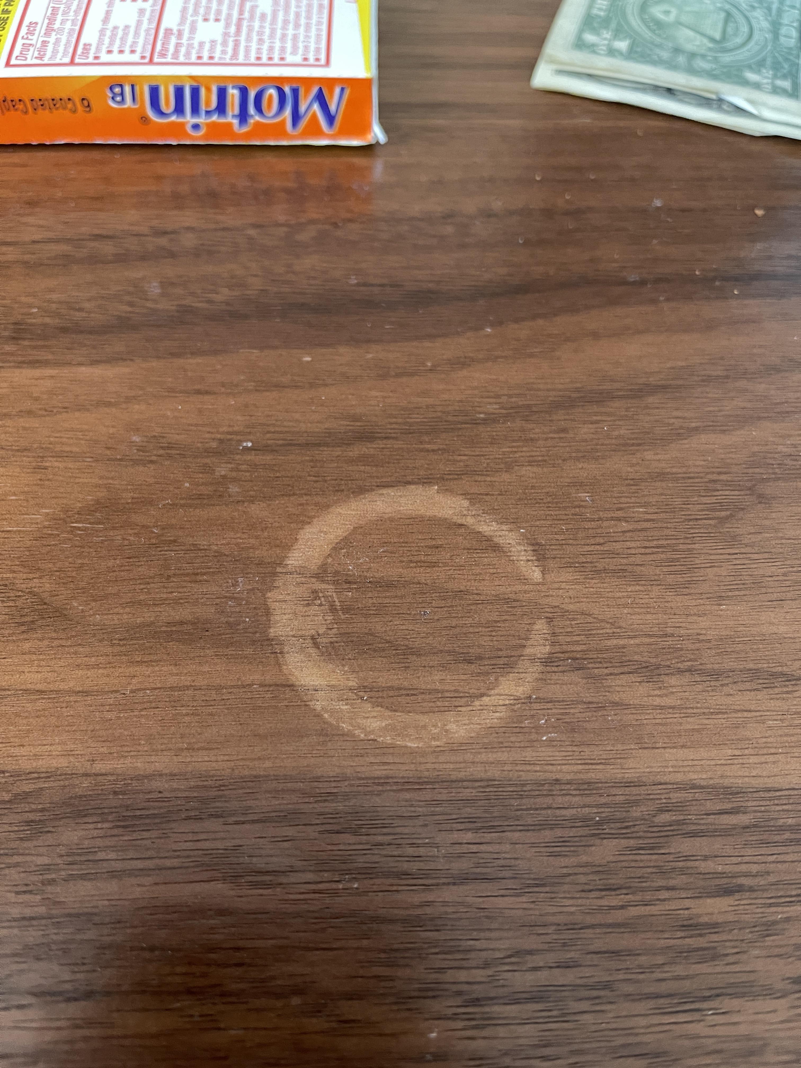 Spilled some essential oil now there’s a ring stain on the table. What