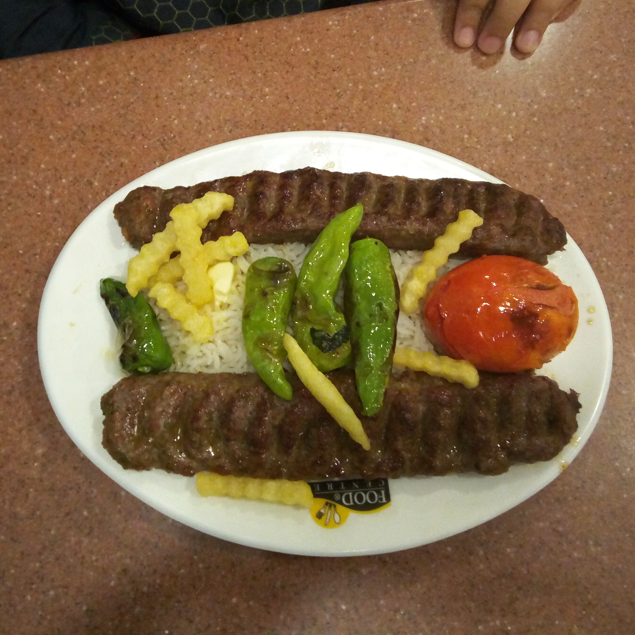 [I Ate] Chullu Kabab, an Iranian dish consisting of kababs served with