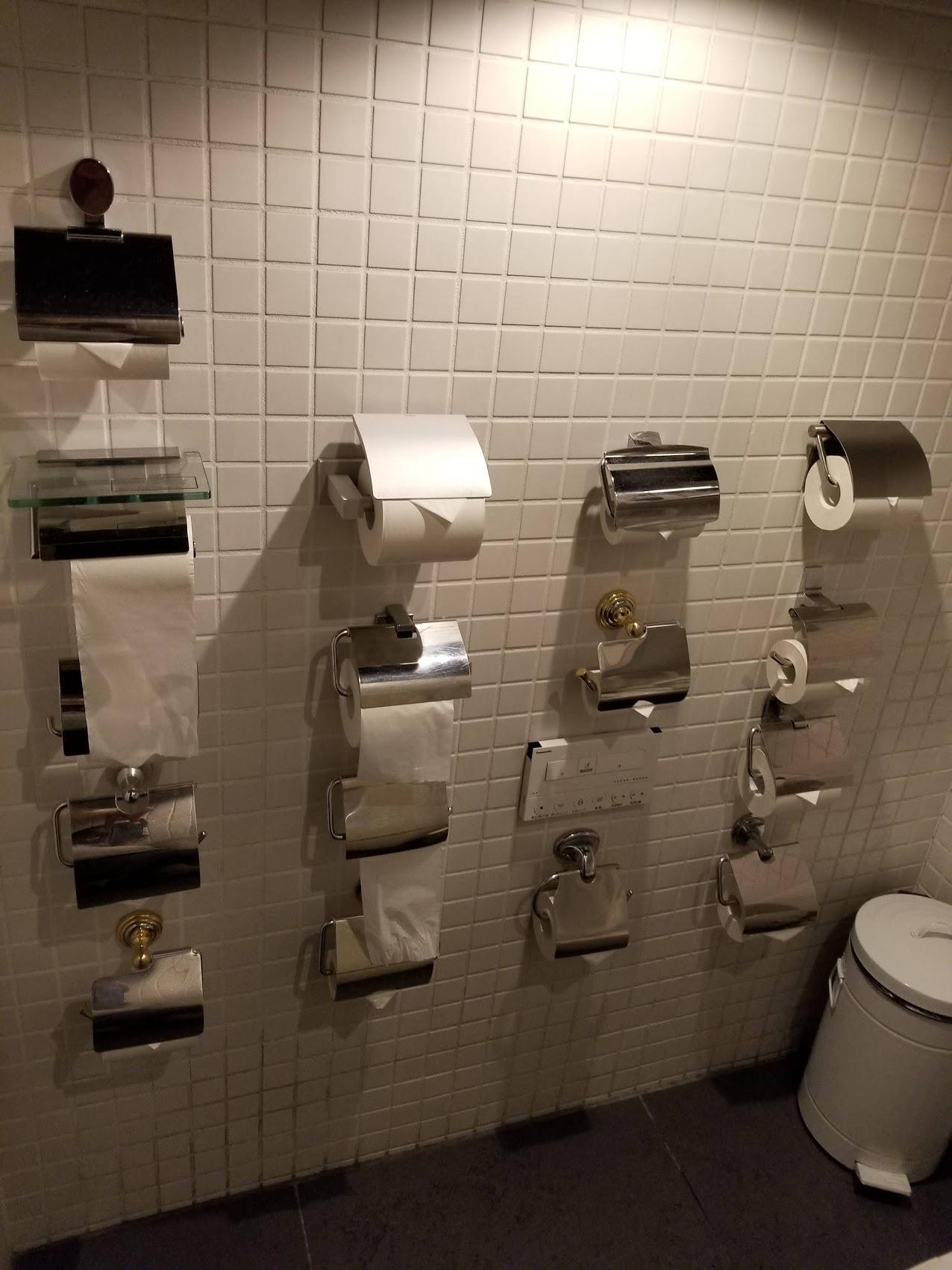 The amount of toilet paper on the wall in a bathroom at this popular