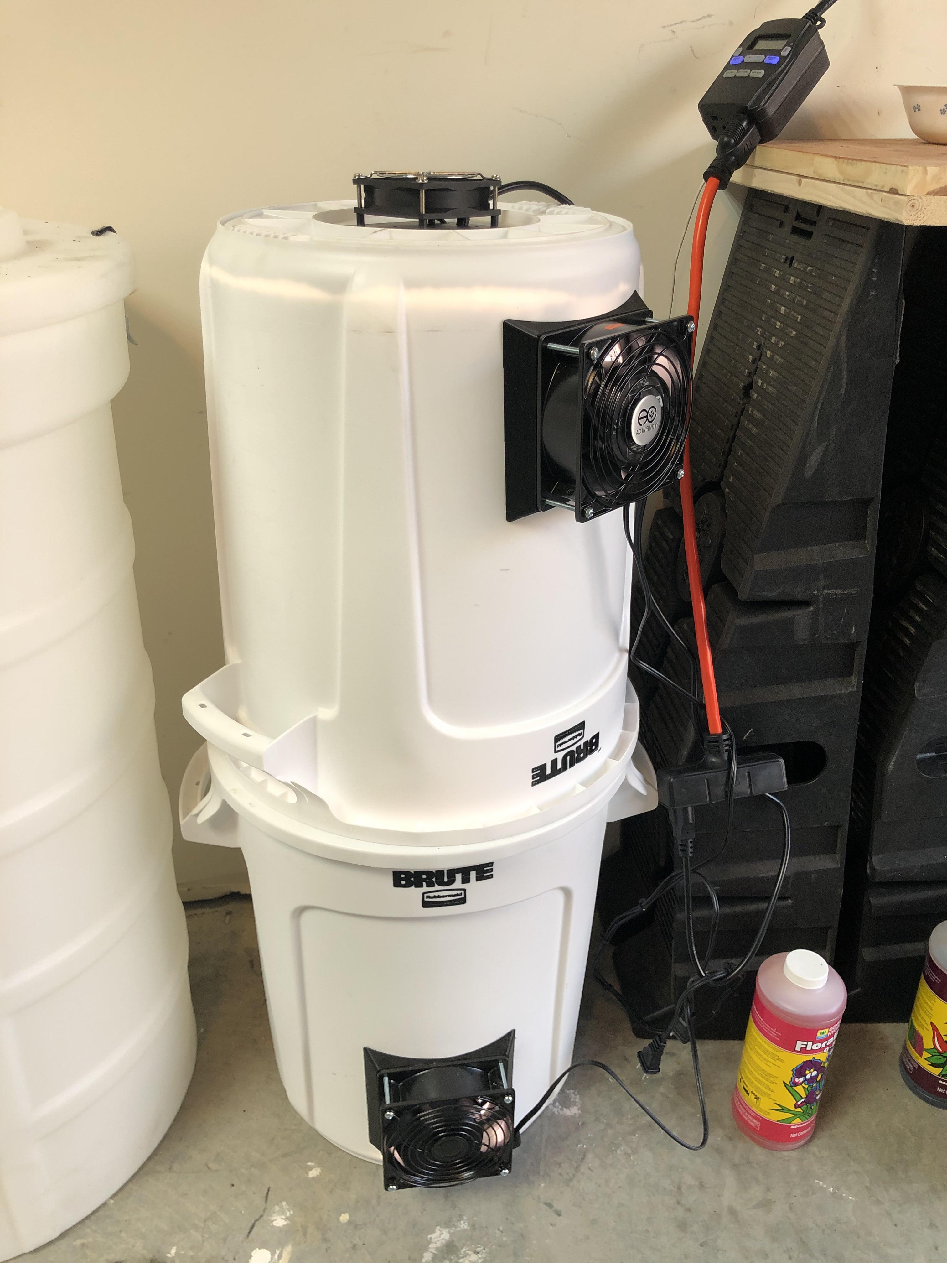 Trash cans. Light on top. Intake and exhaust fans. Lined with