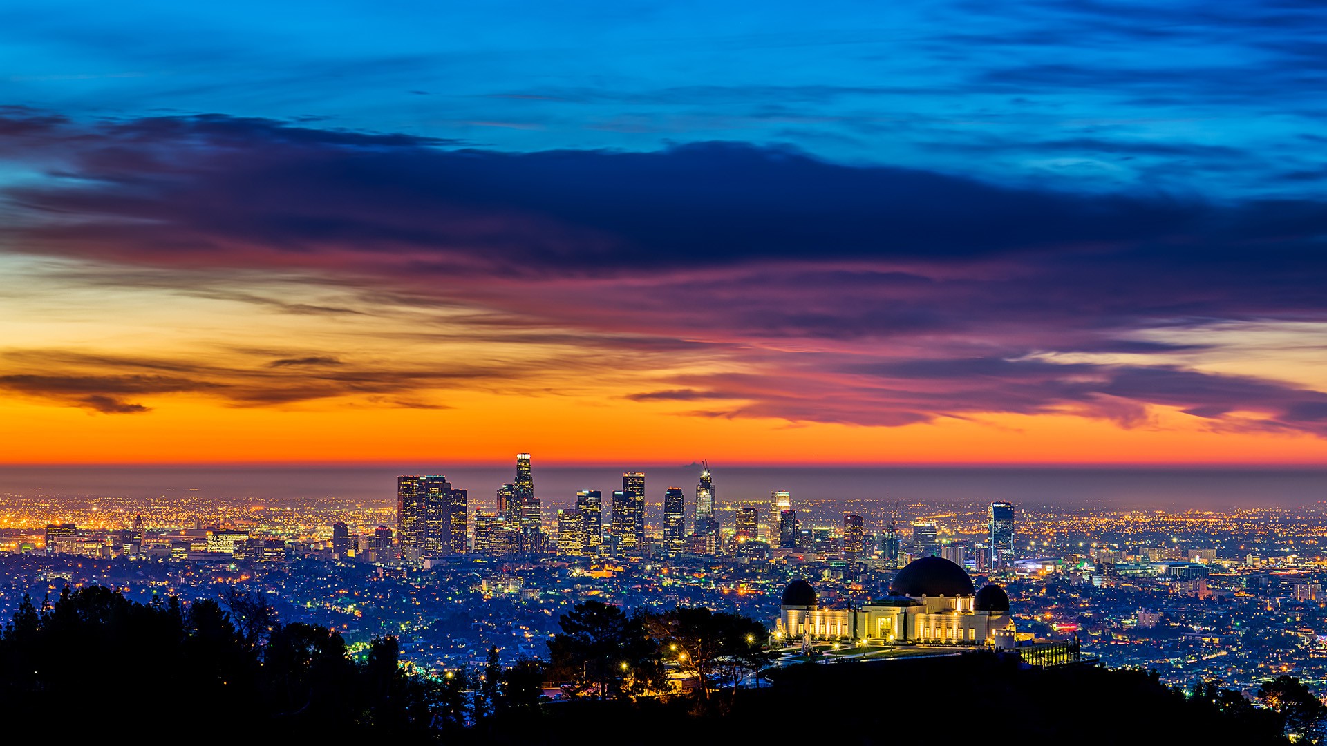 The Griffith Park Observatory, with the downtown Los Angeles skyline in