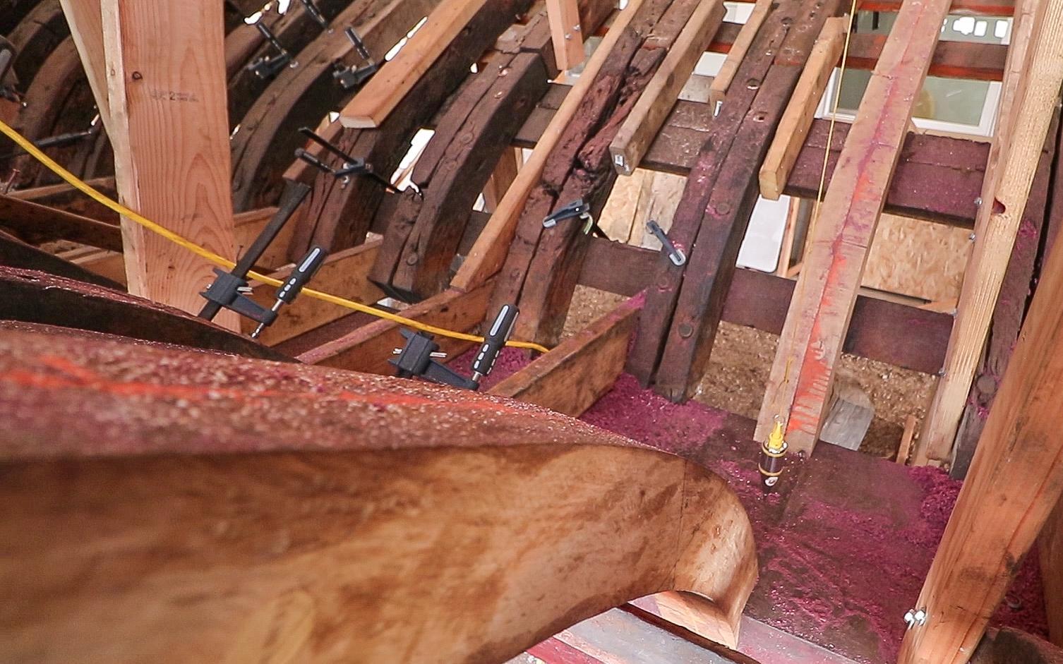 The first new Live Oak frames just got notched into the Purpleheart