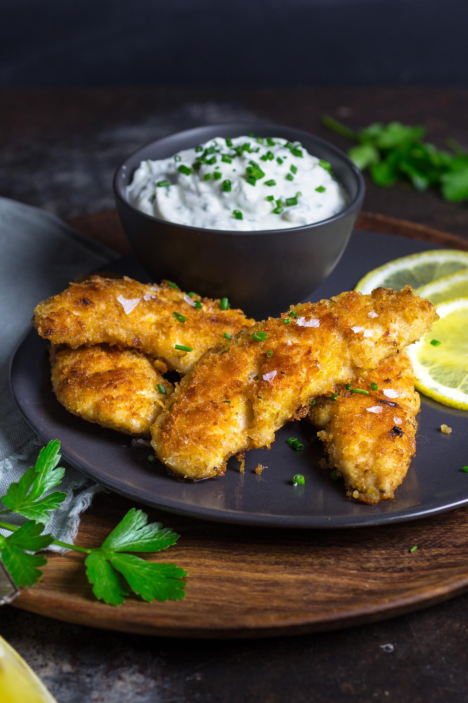 Crispy, crunchy, garlicky ovenfried chicken tenders with herb and