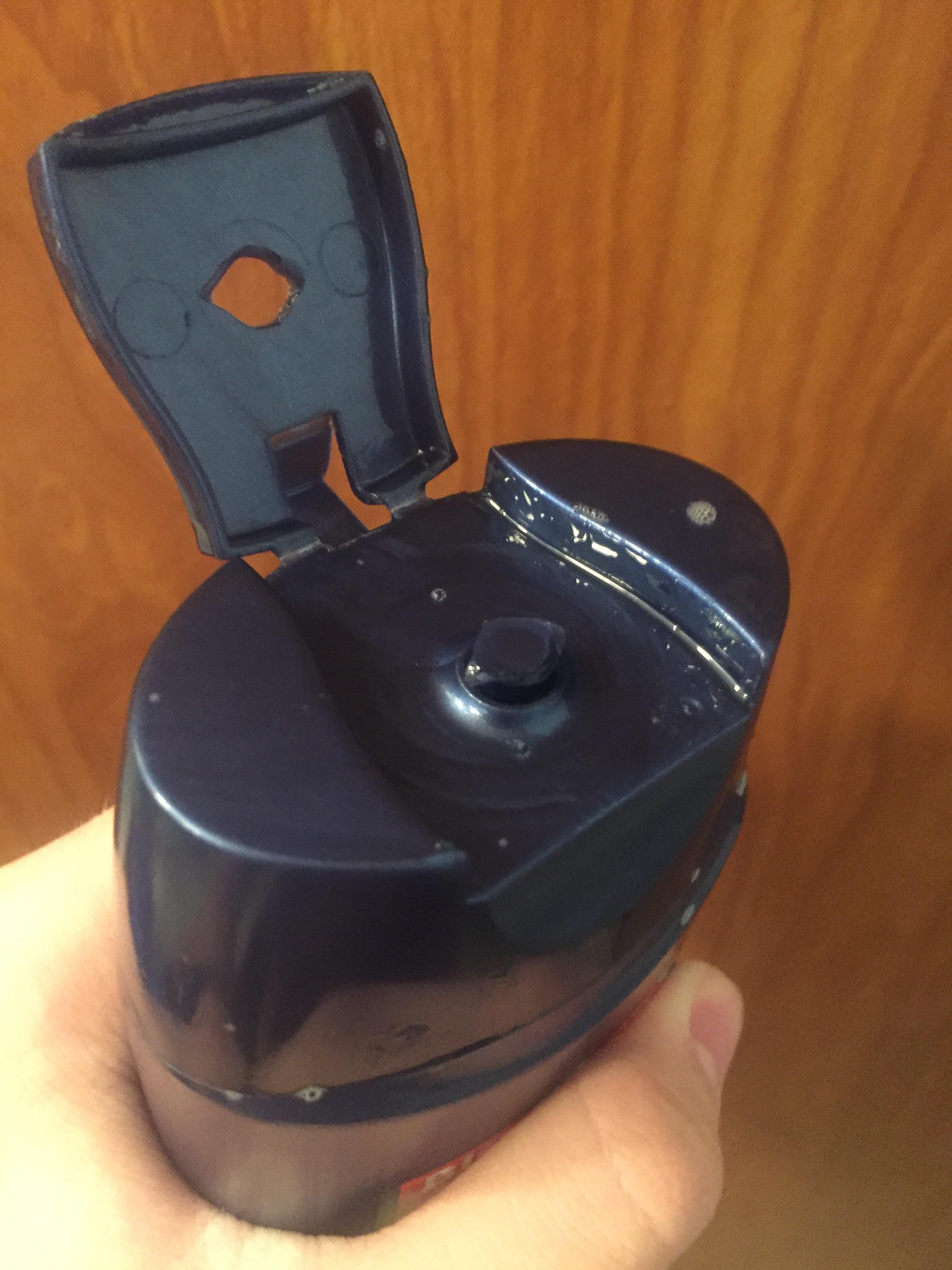 Part of the lid of my shampoo bottle disconnected and got stuck to the hole. r/mildlyinteresting