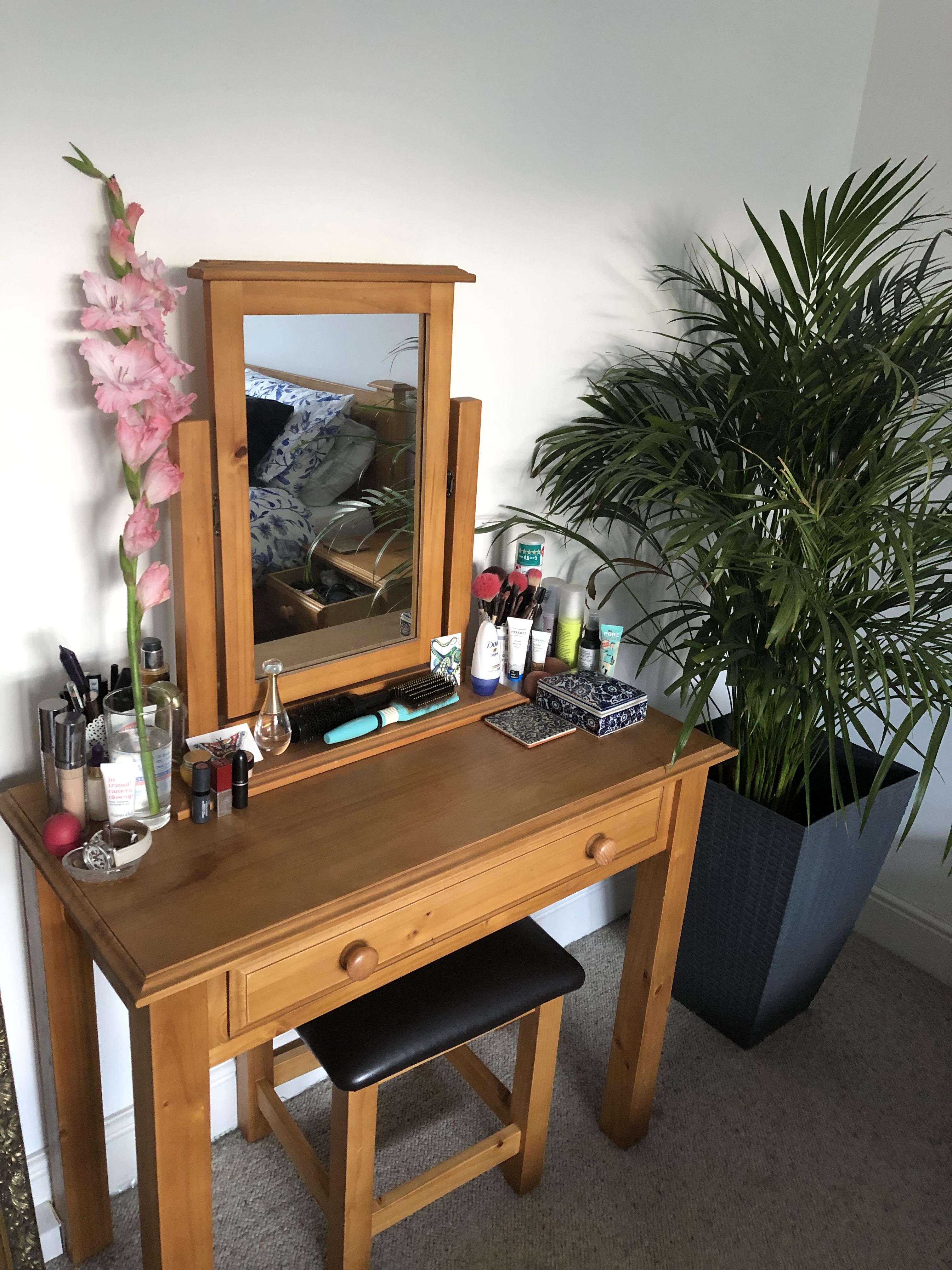 My vanity set up, complete with a fresh flower from the garden r