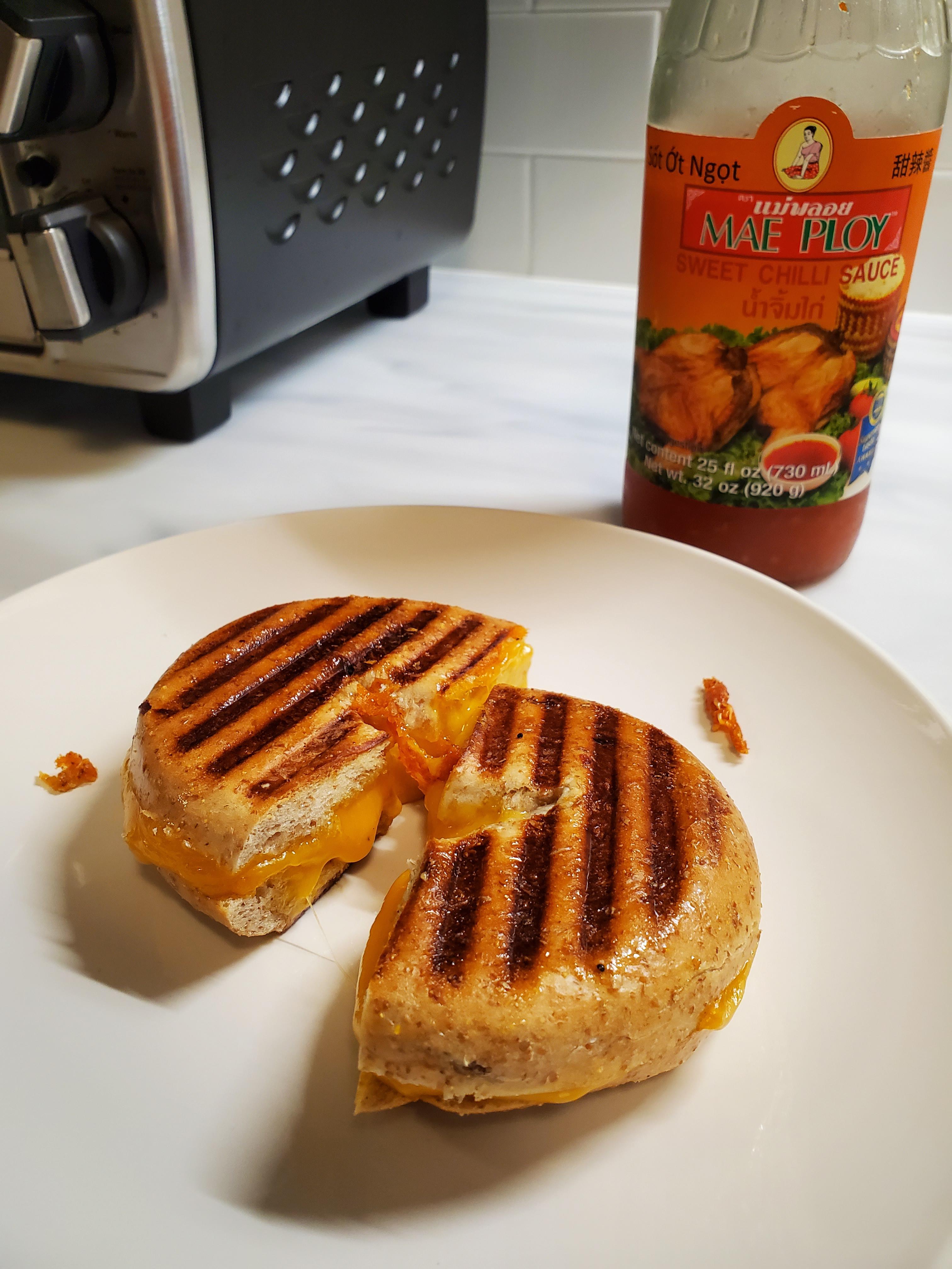 Panini pressed a bunch of extra sharp between a bagel. Thought sweet