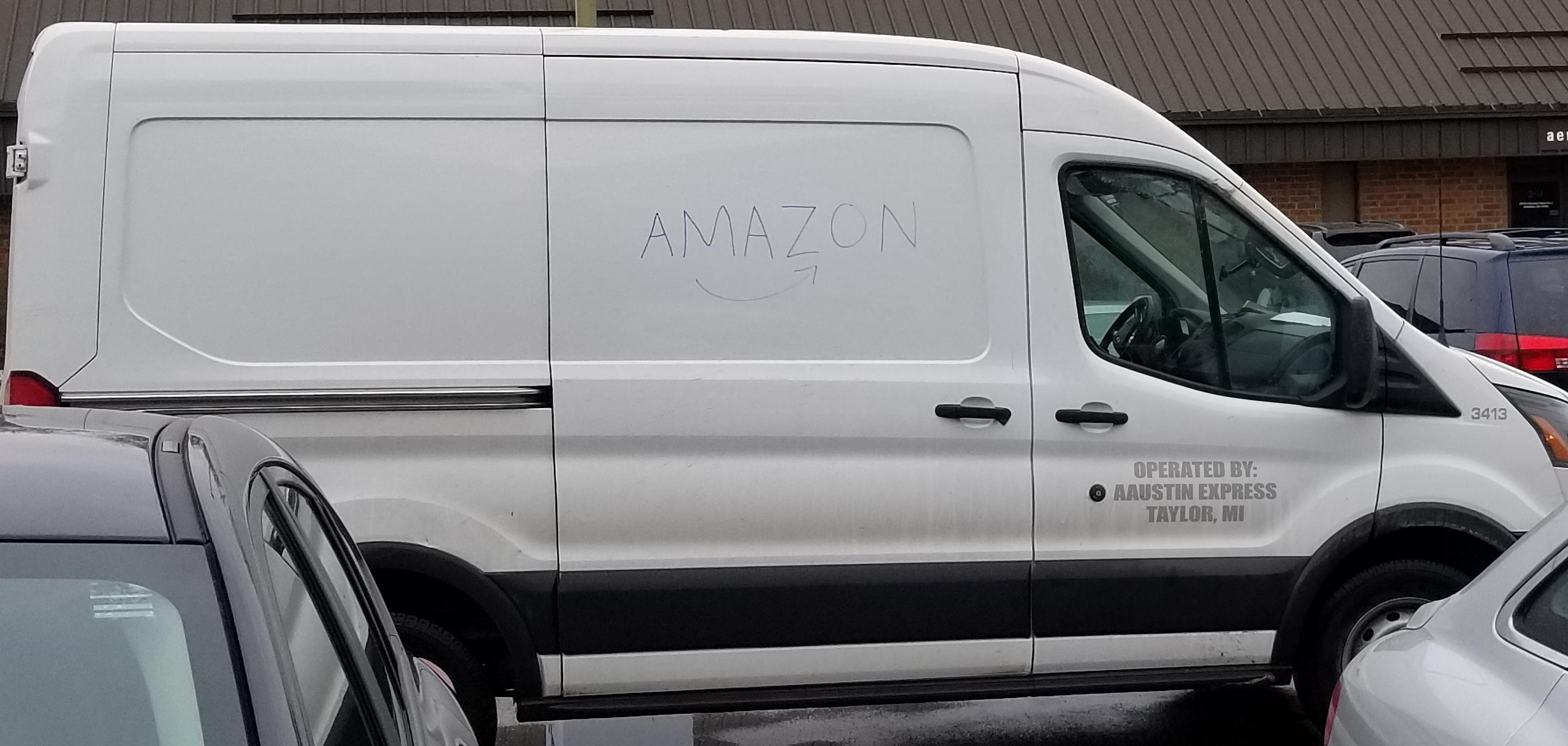 The Amazon delivery van had a hand drawn logo. r/mildlyinteresting