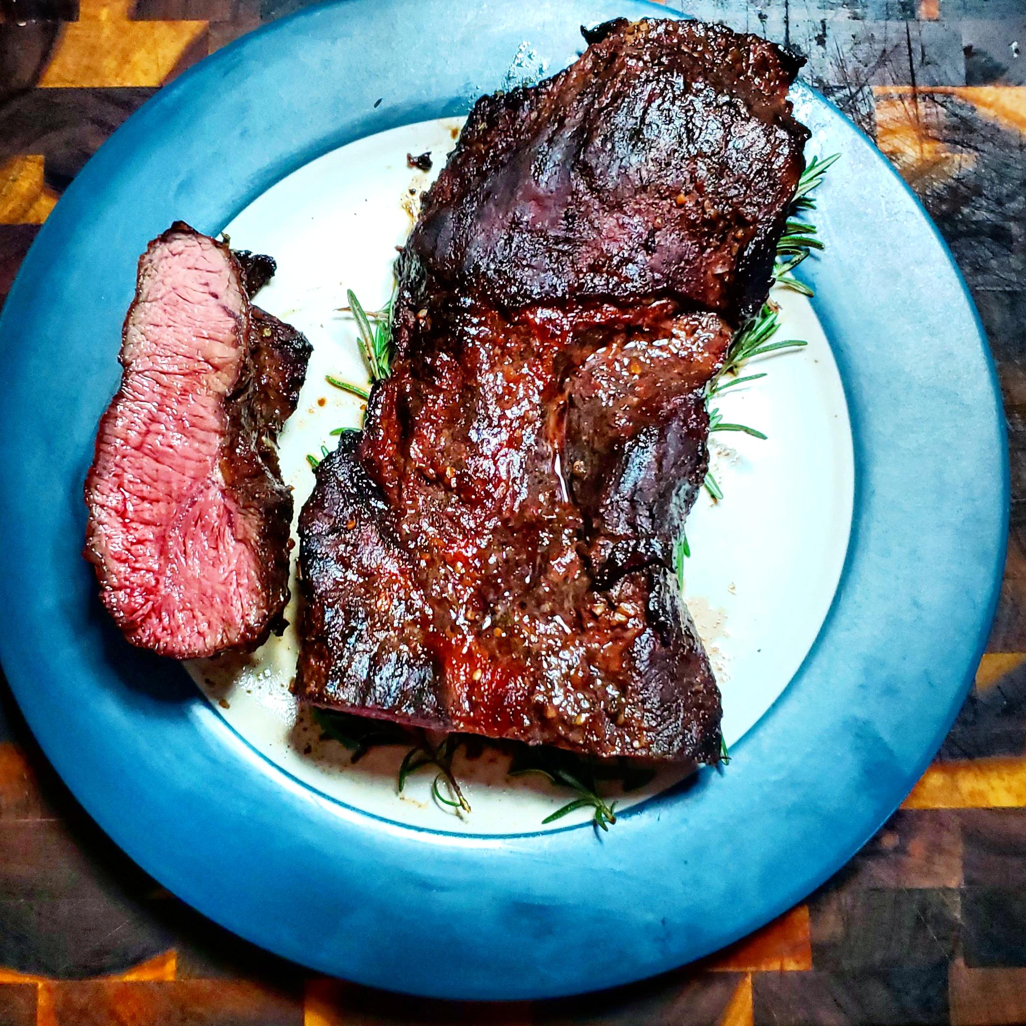 Smoked and chacoal cooked flank steak grilling