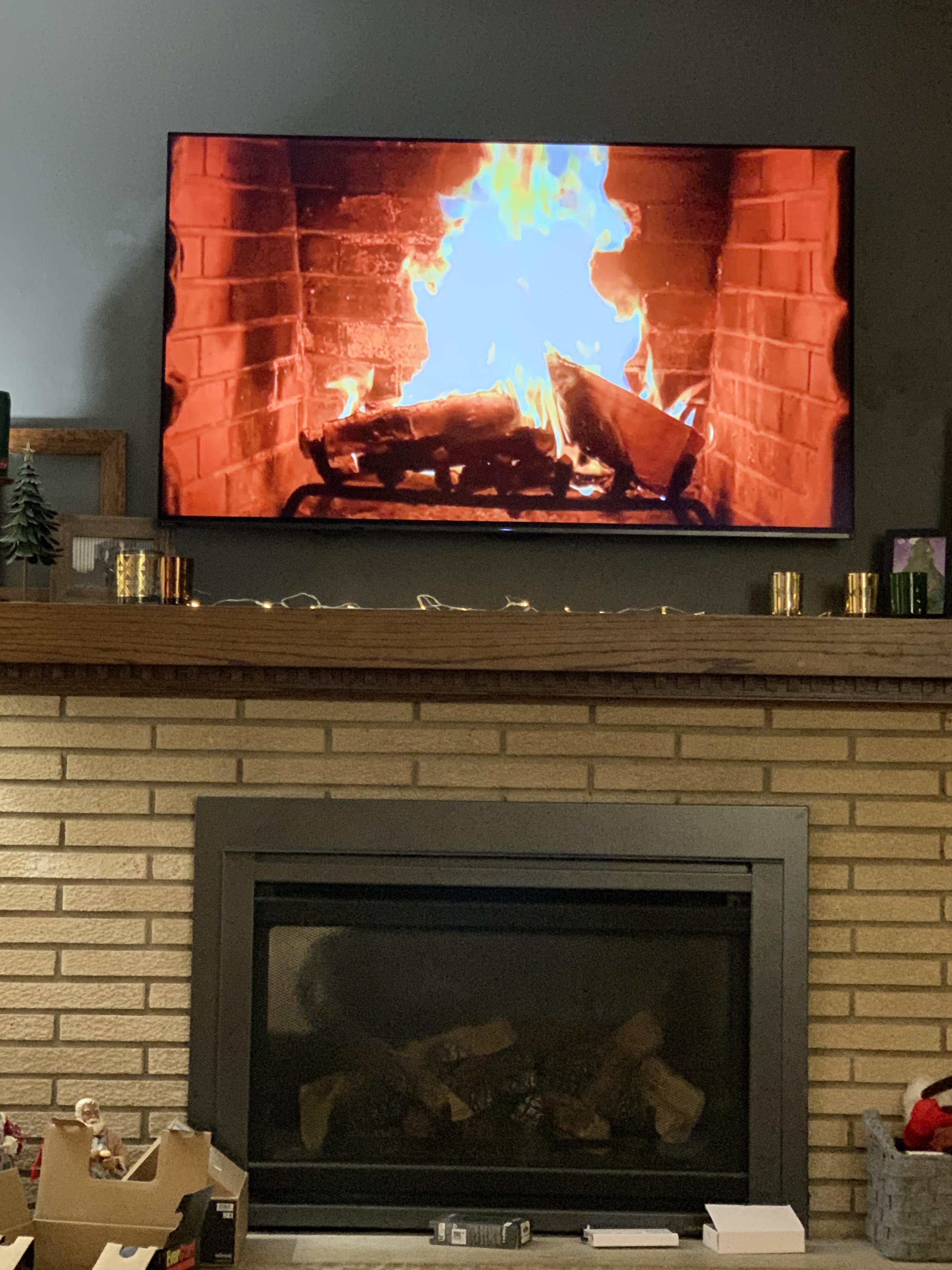 My mom put a fireplace video on the living room tv that’s directly
