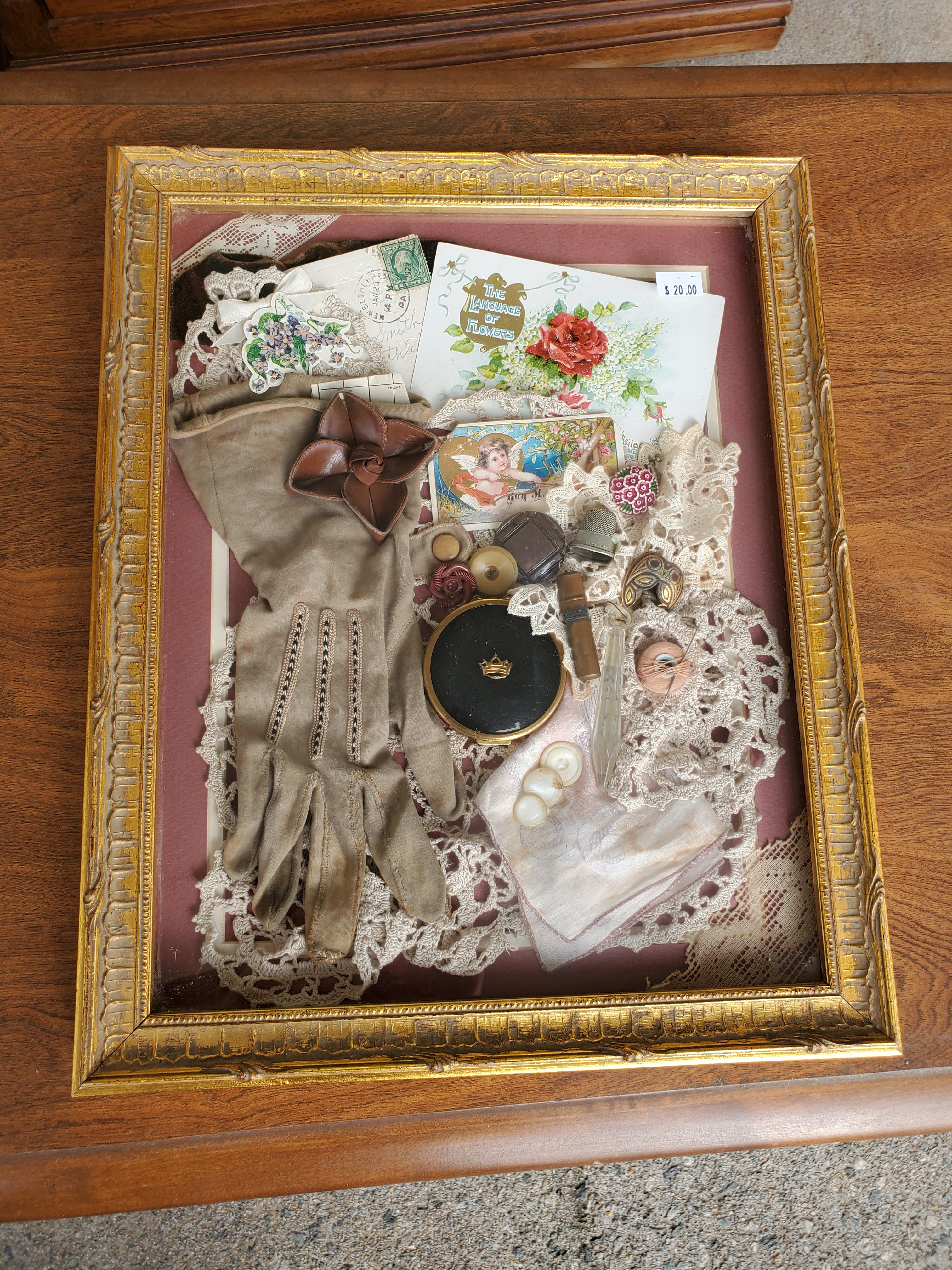 I found this beautiful shadowbox full of vintage treasures for 20! r