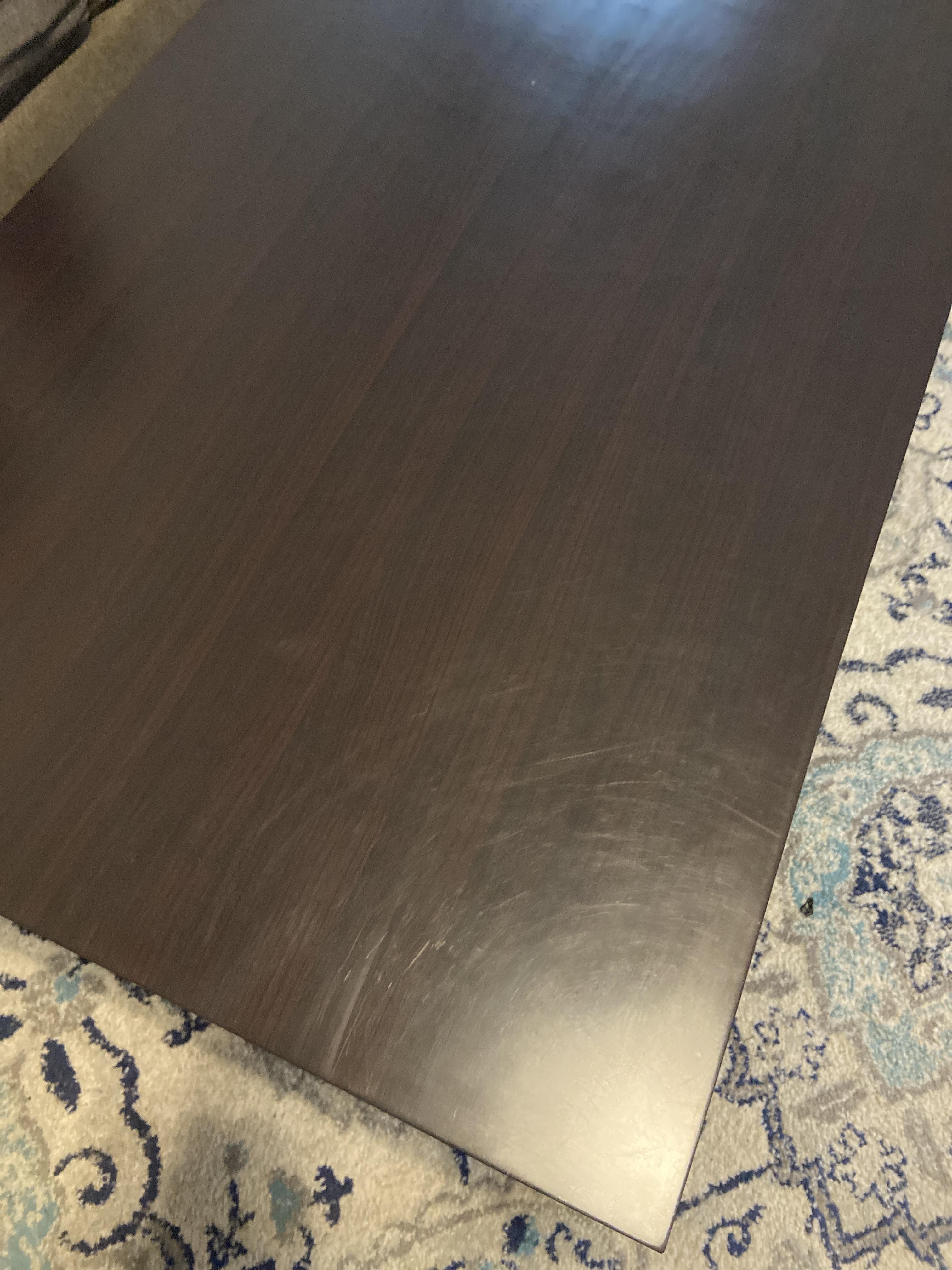 How can I get these little surface scratches off my wood veneer table