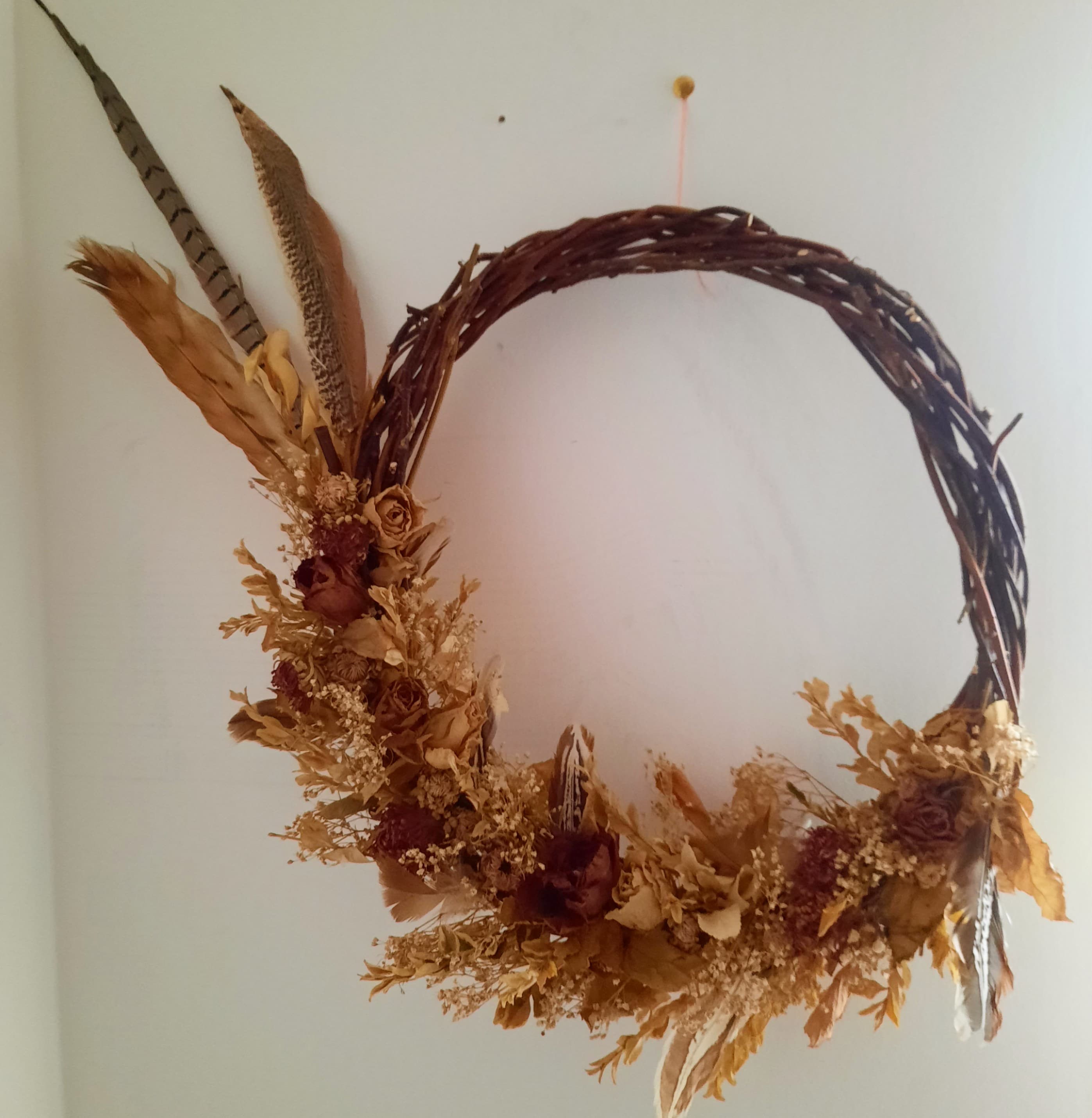 I dried my wedding flowers and turned them into a wreath using dogwood