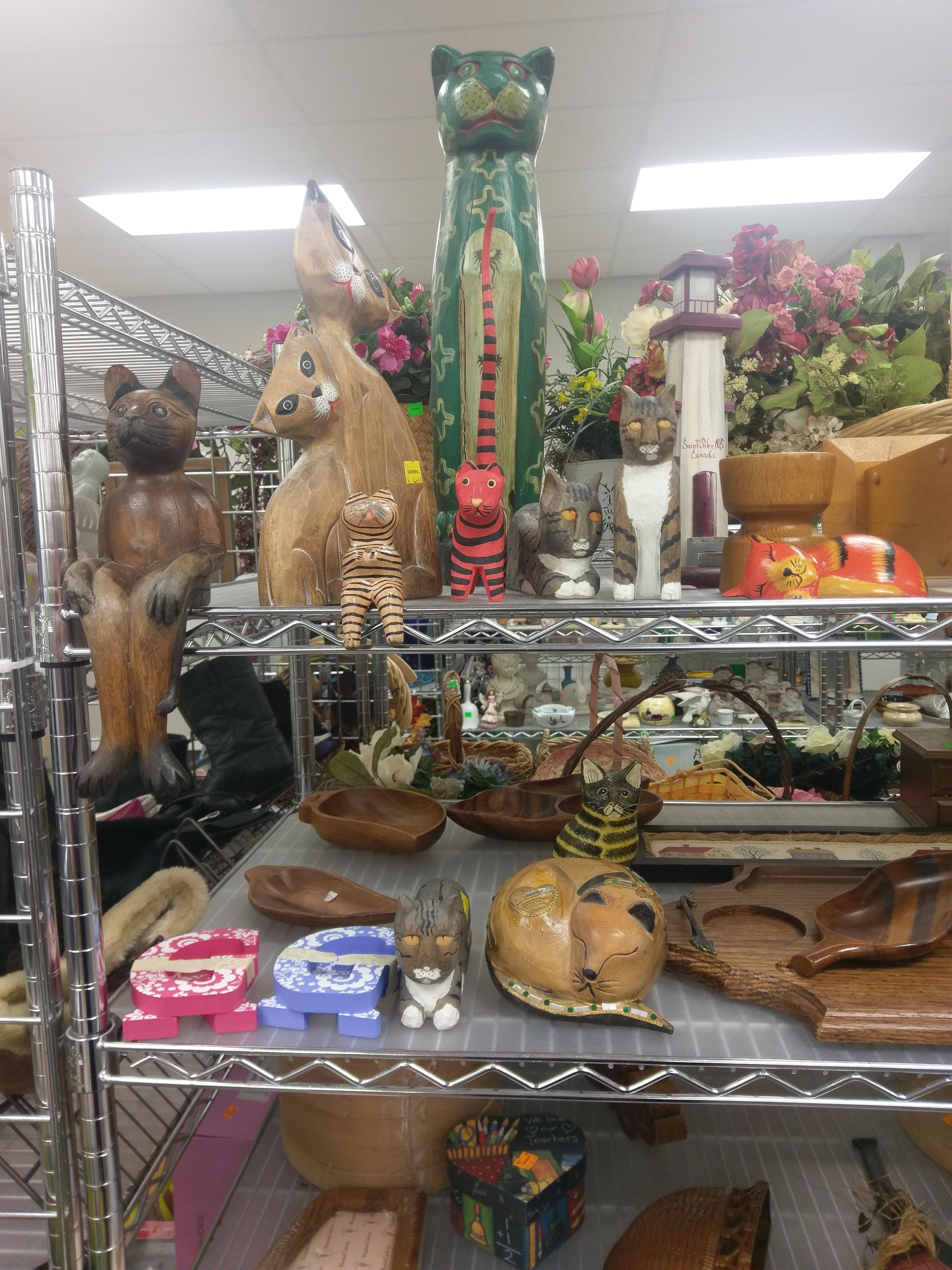 Someone must have donated their weird cat collection to Goodwill r