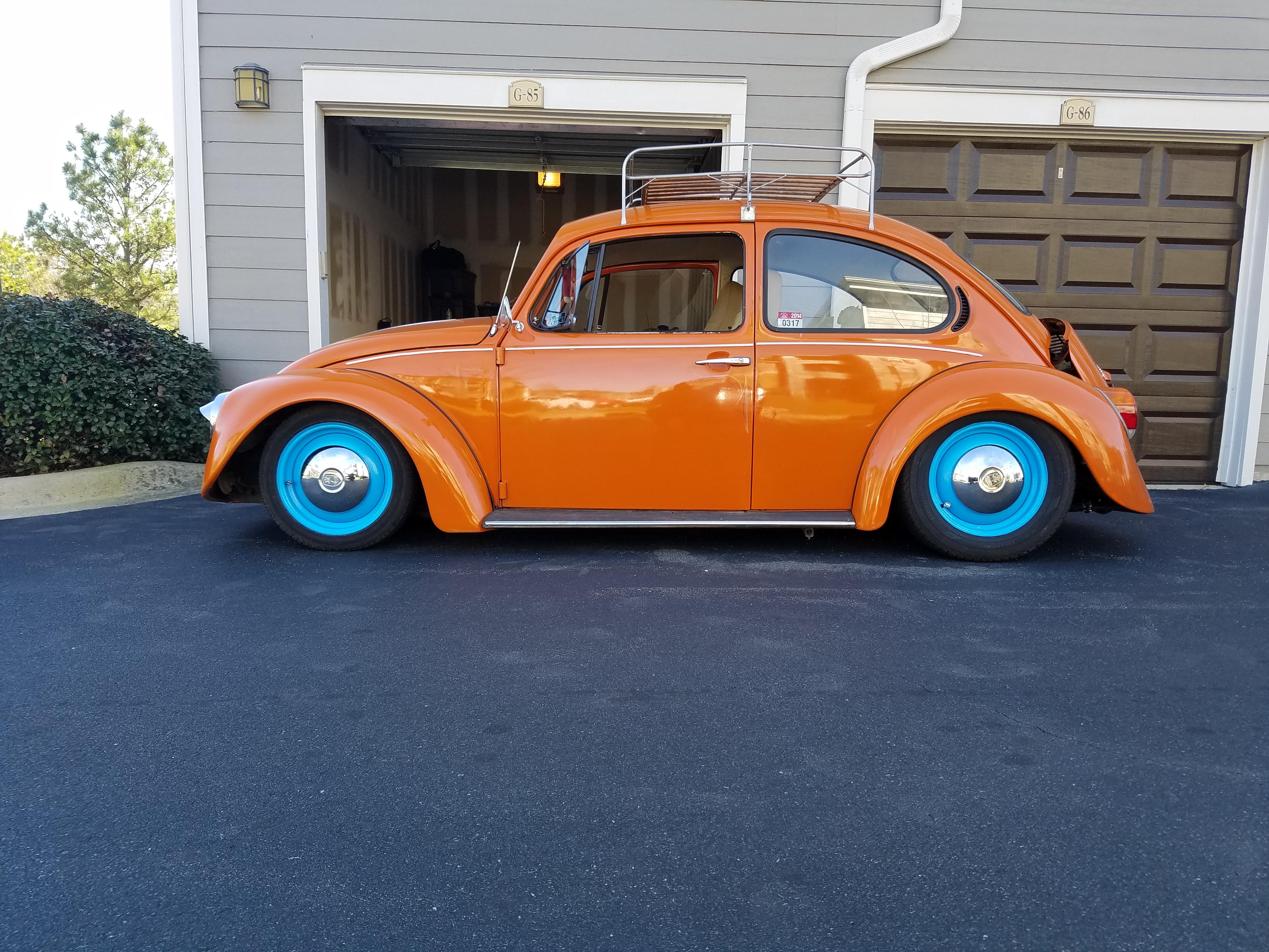 added some flair with painted wheels this weekend. r/beetle