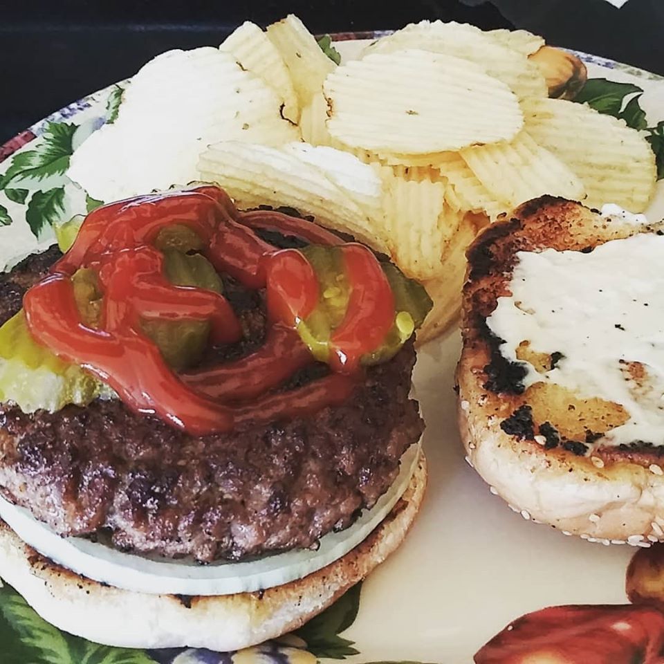 Simple homemade halfpound burger w/fried buns. r/hamburgers