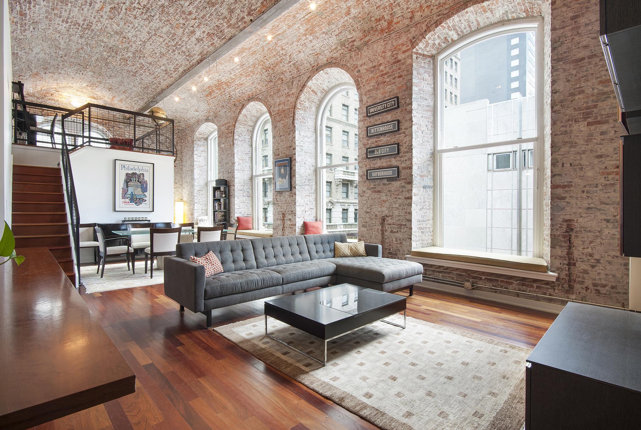 Brick barrel vaulted ceiling and 12foot windows in this Philadelphia