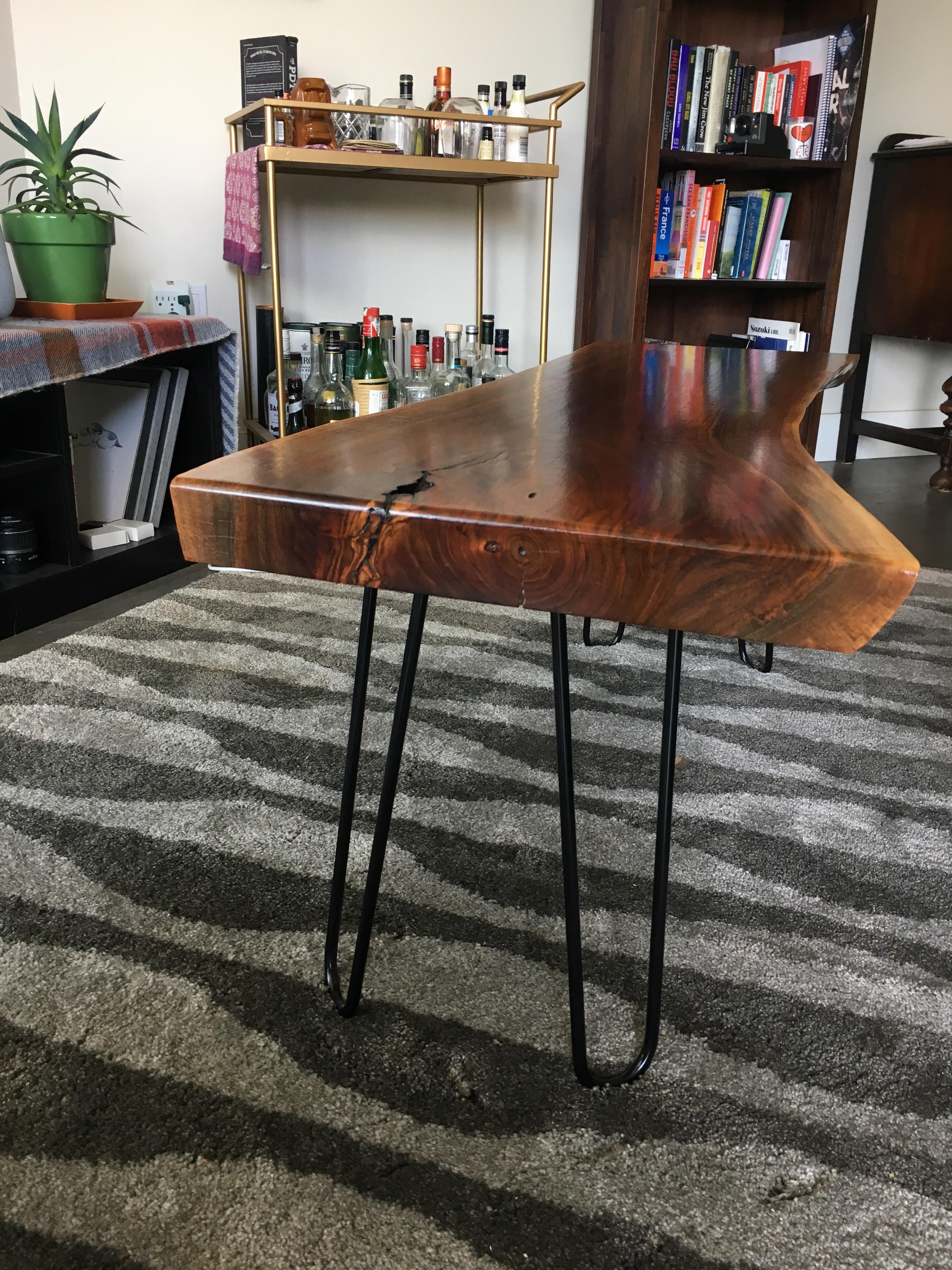 My first woodworking project a live edge black walnut coffee table with shellac finish. r