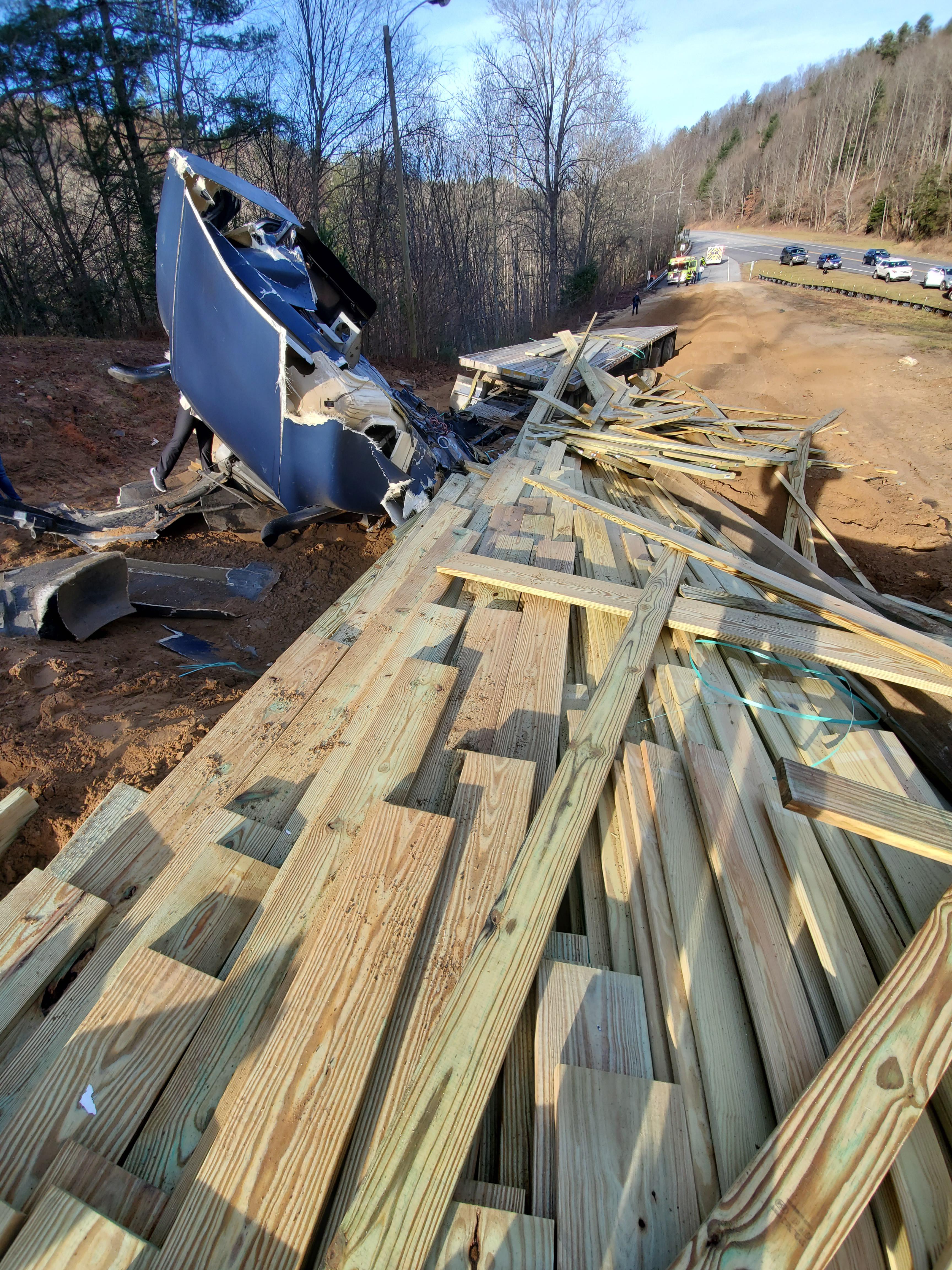 Trucks brakes fail on mountian road. Driver decides to use runaway ramp traveling about 60 mph