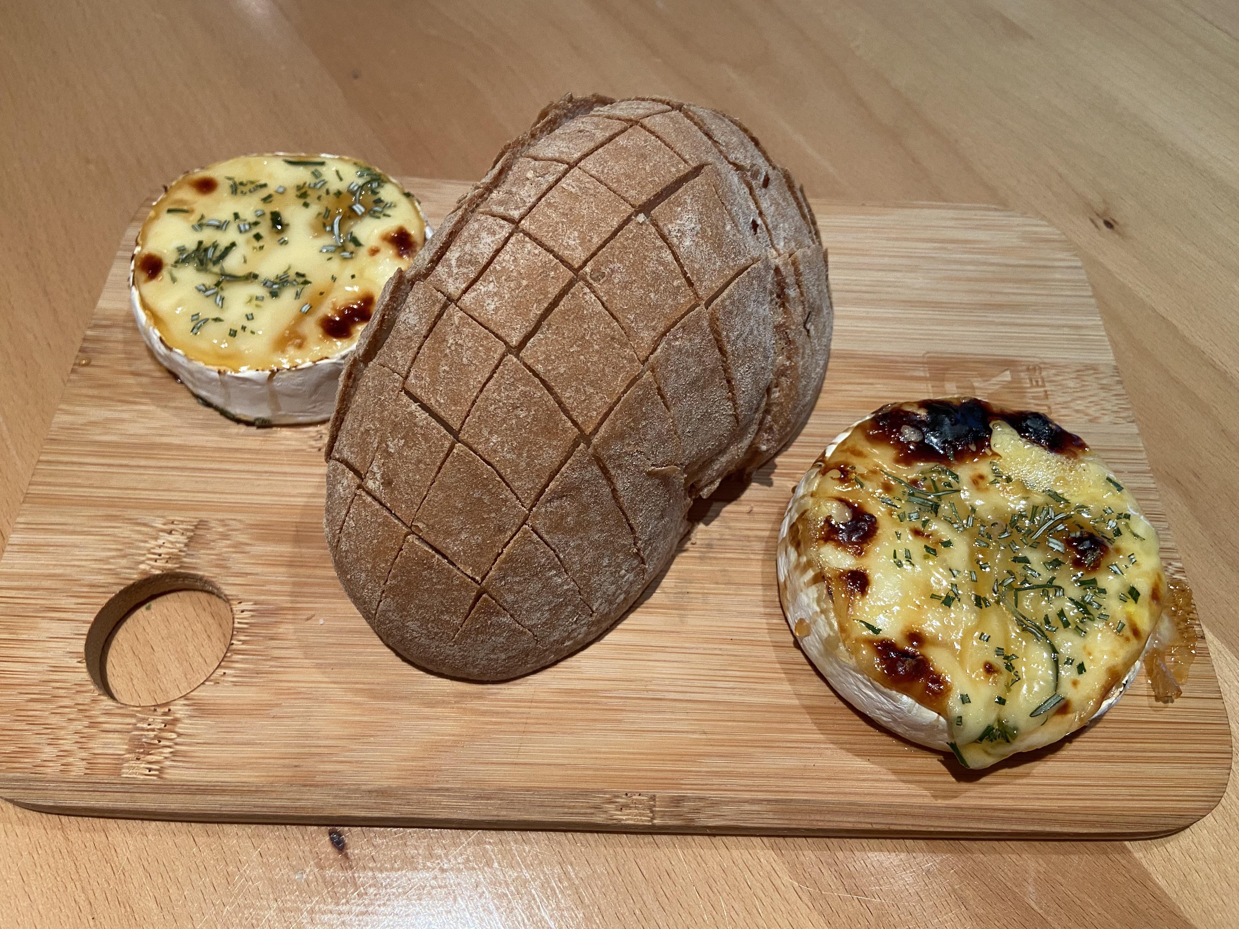 Baked Lactose Free Brie and Camembert topped with honey and rosemary