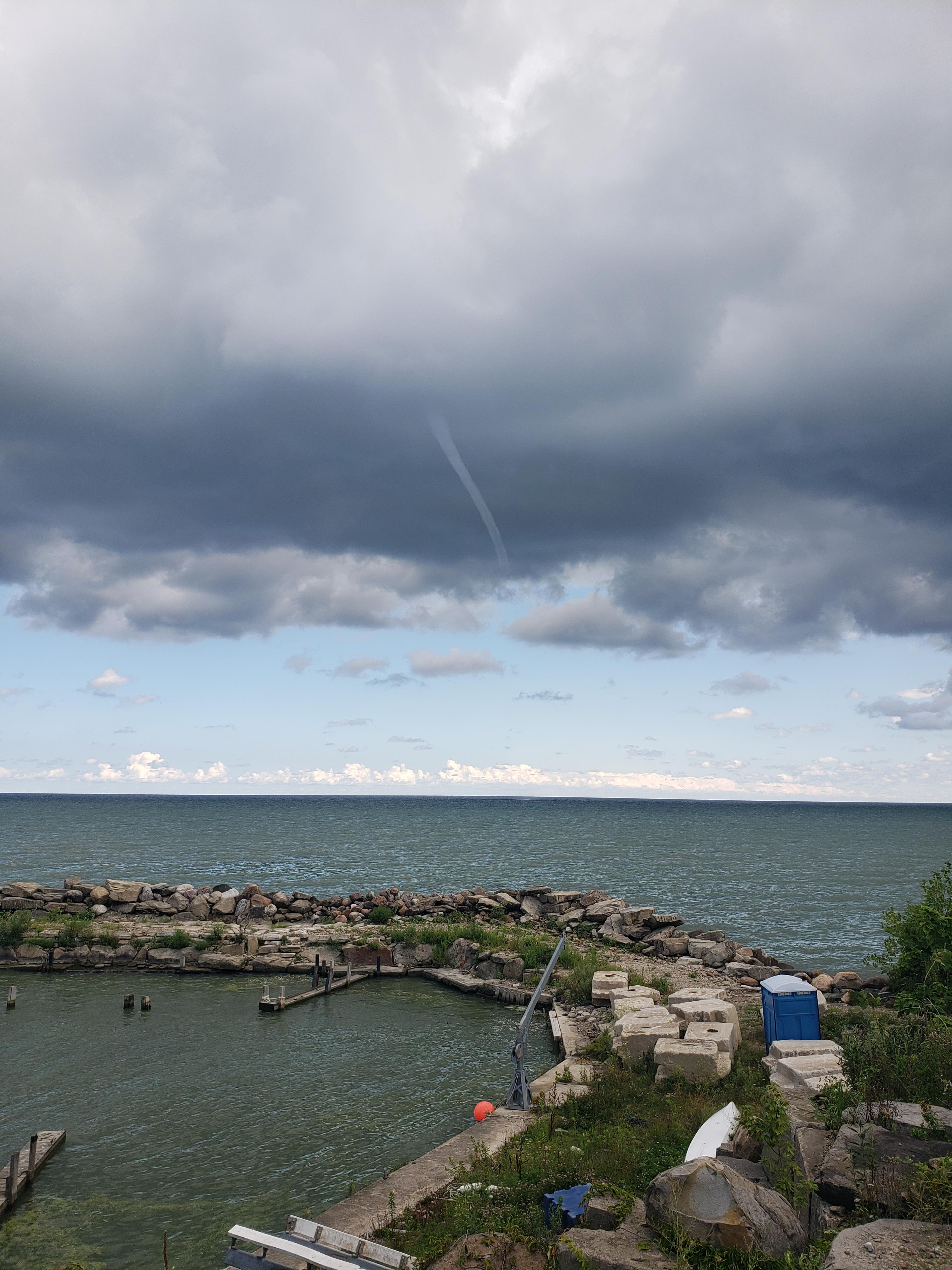 Really enjoying the waterspout show here in Avon Lake r/Cleveland