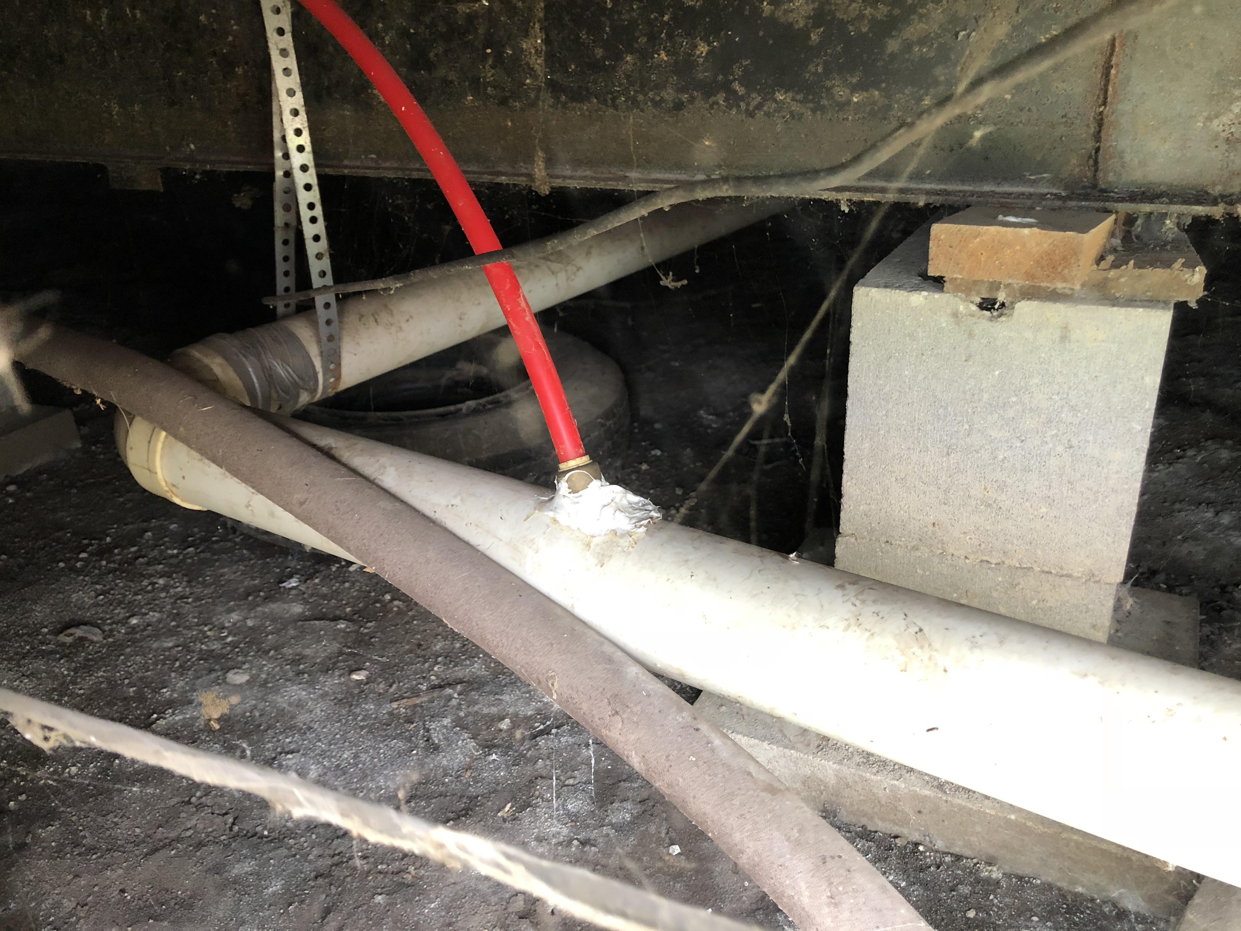 Water softener discharge line, gotta love how they do it in the trailer