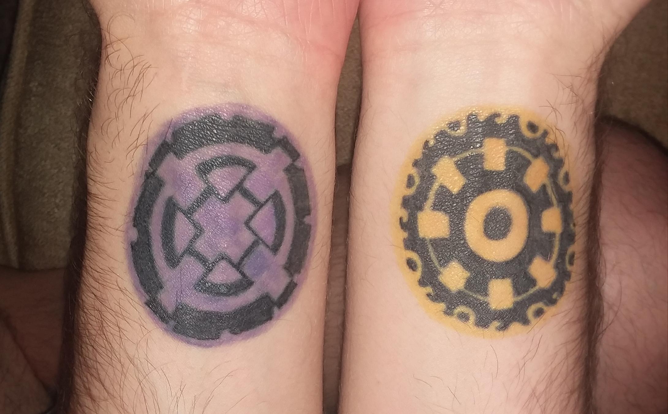 I got my Boktai wrist tattoos touched up recently. Boktai