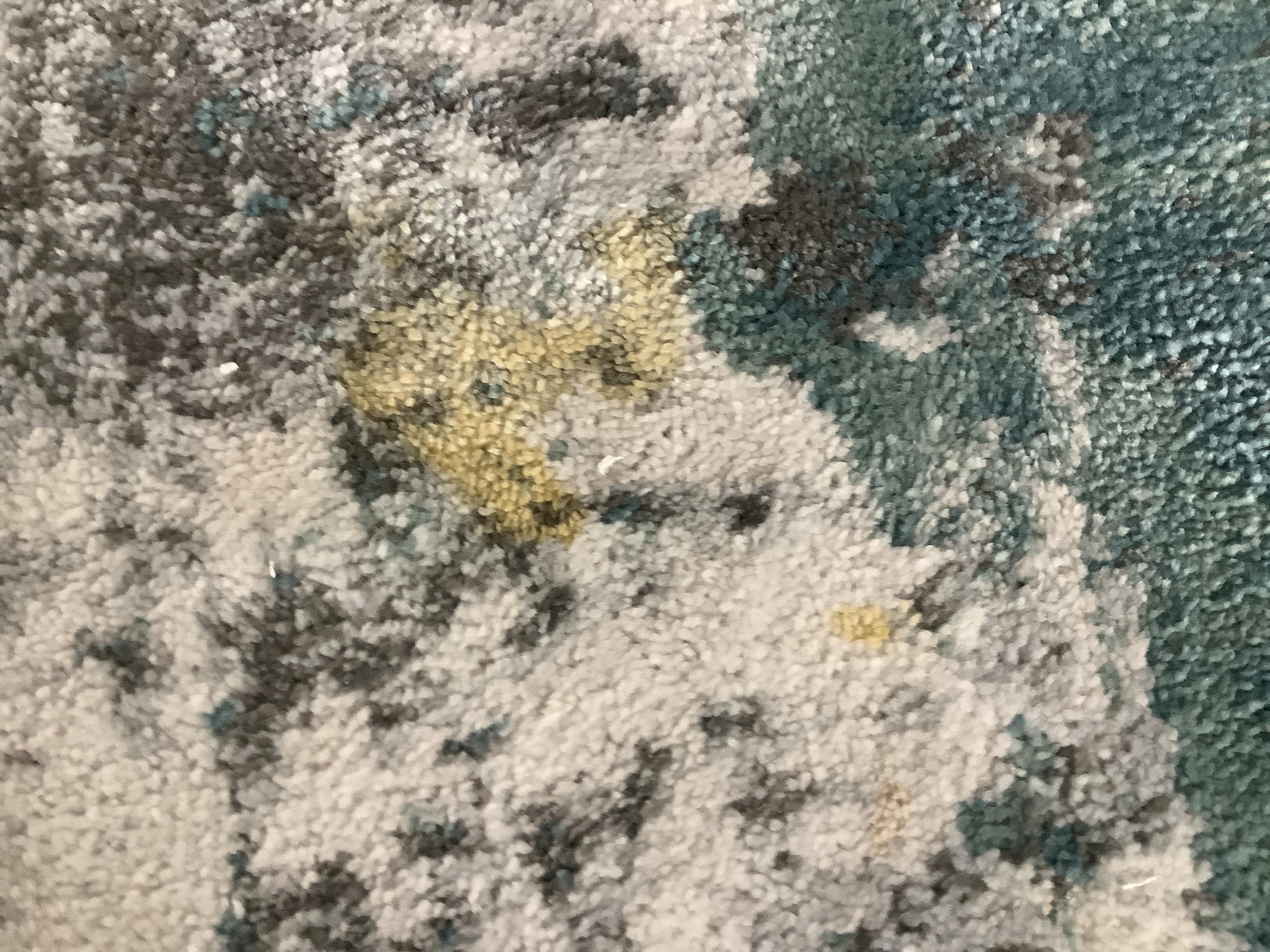 I accidentally spilled a bit of mango juice on my families carpet, how