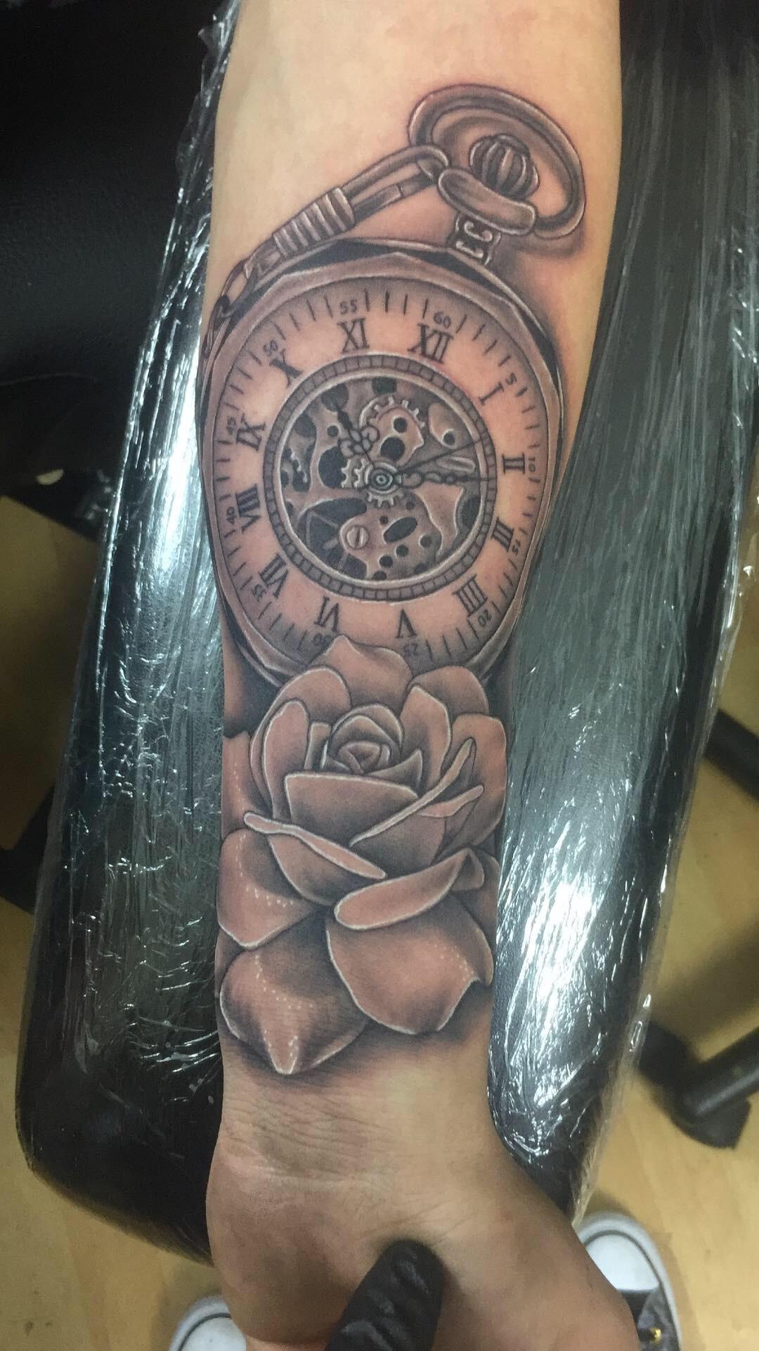 Fun rose and clock tattoo I did today. r/tattoo