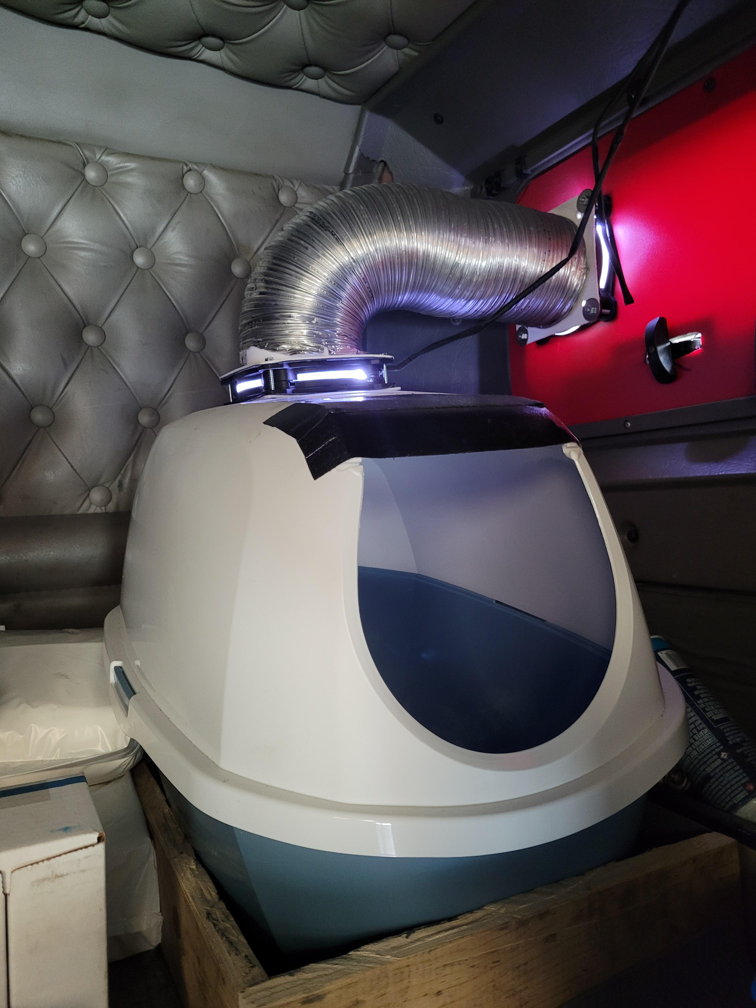 This litterbox vent system I made with 2 pc fans and some ductwork. (It