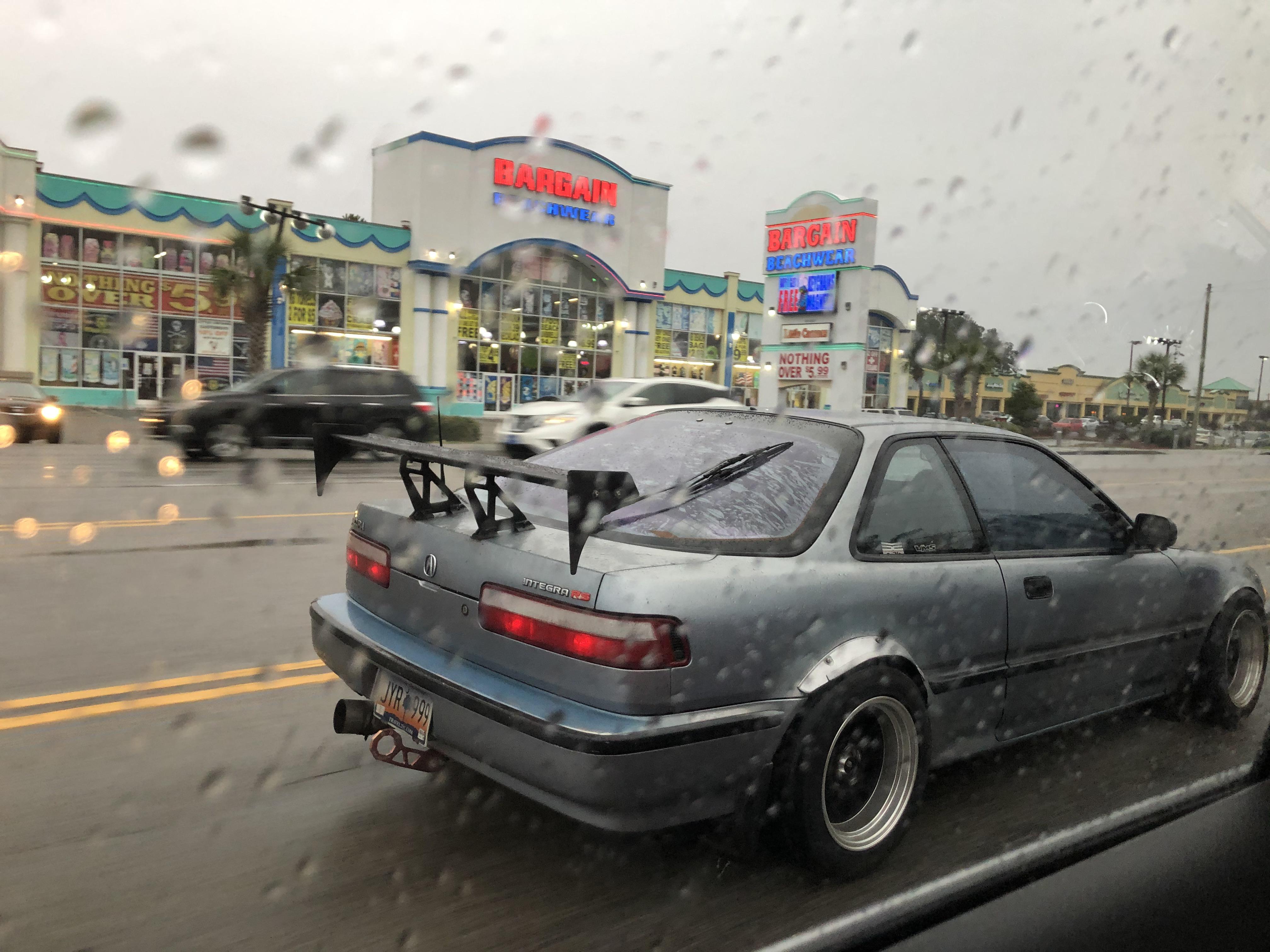 A spoiler on a fwd car. Why? r/Shitty_Car_Mods