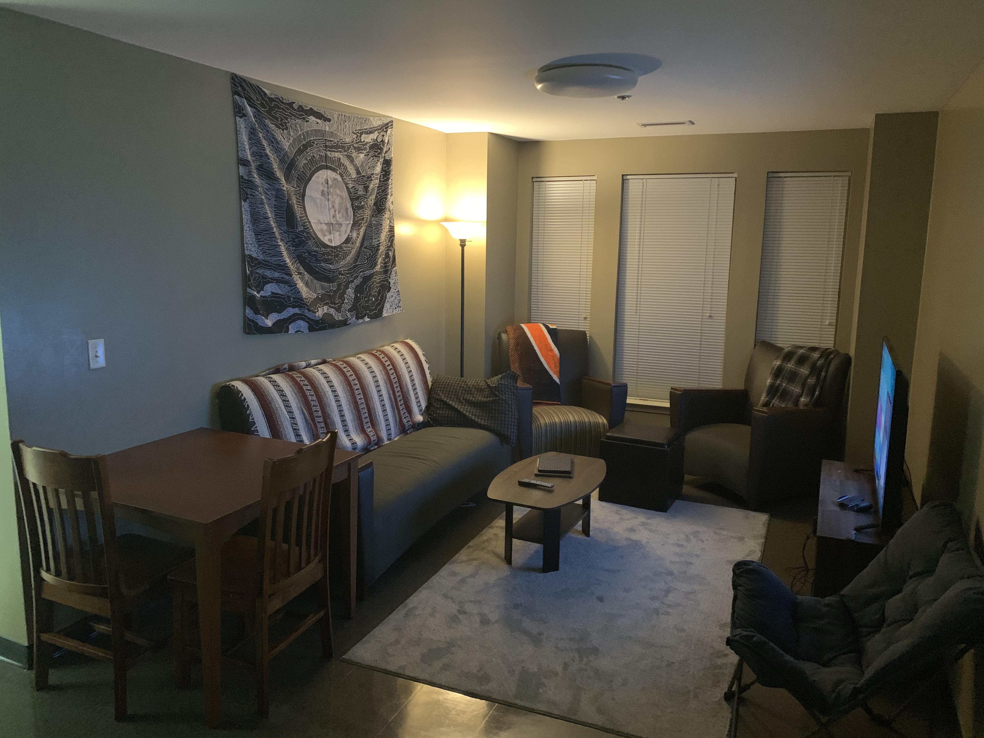 Our college dorm featuring a chair we took from the lobby and cheap