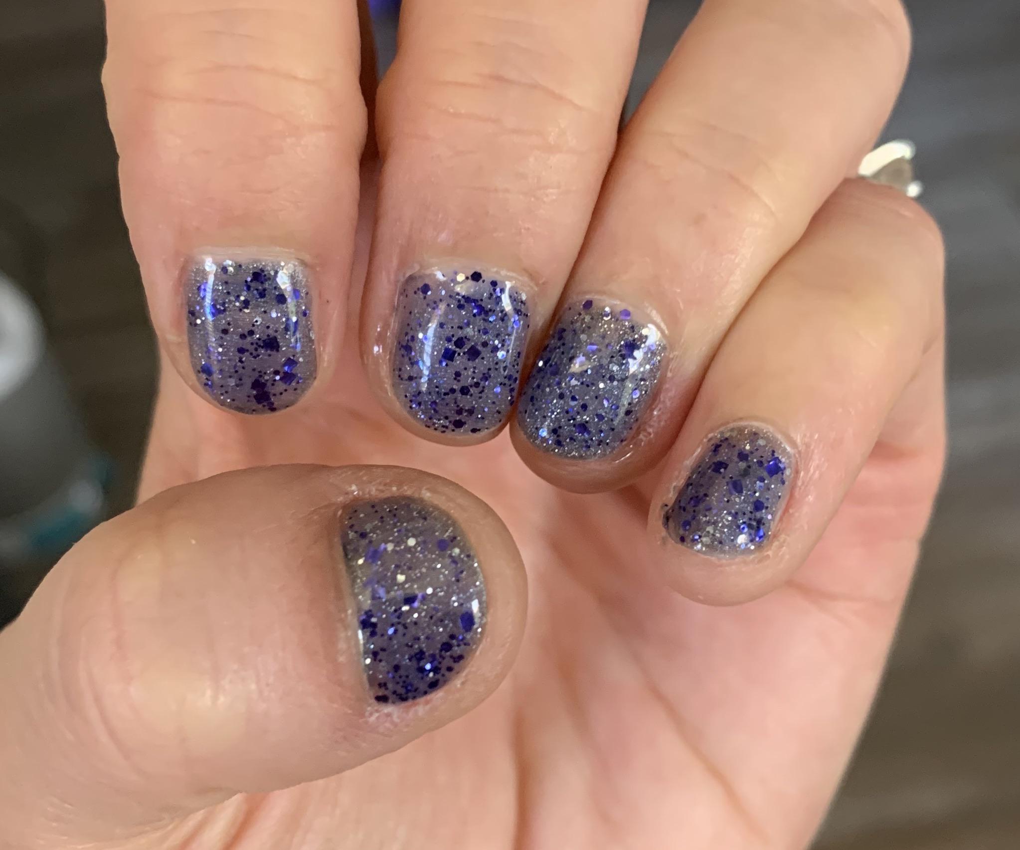 Gray glitter gel polish with blue glitter gel polish on top r