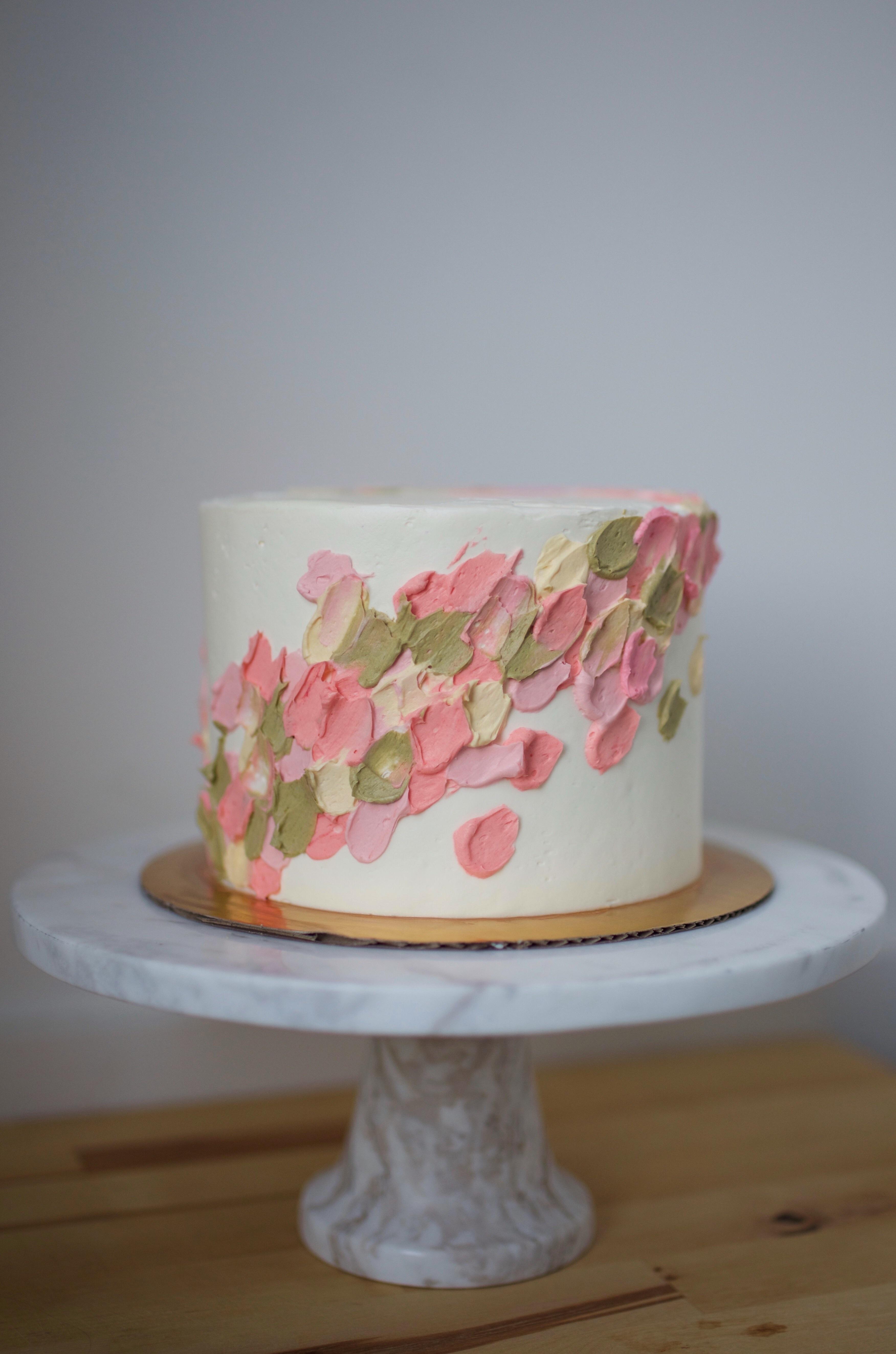 buttercream bakerystyle lemon cake with raspberry filling and vanilla