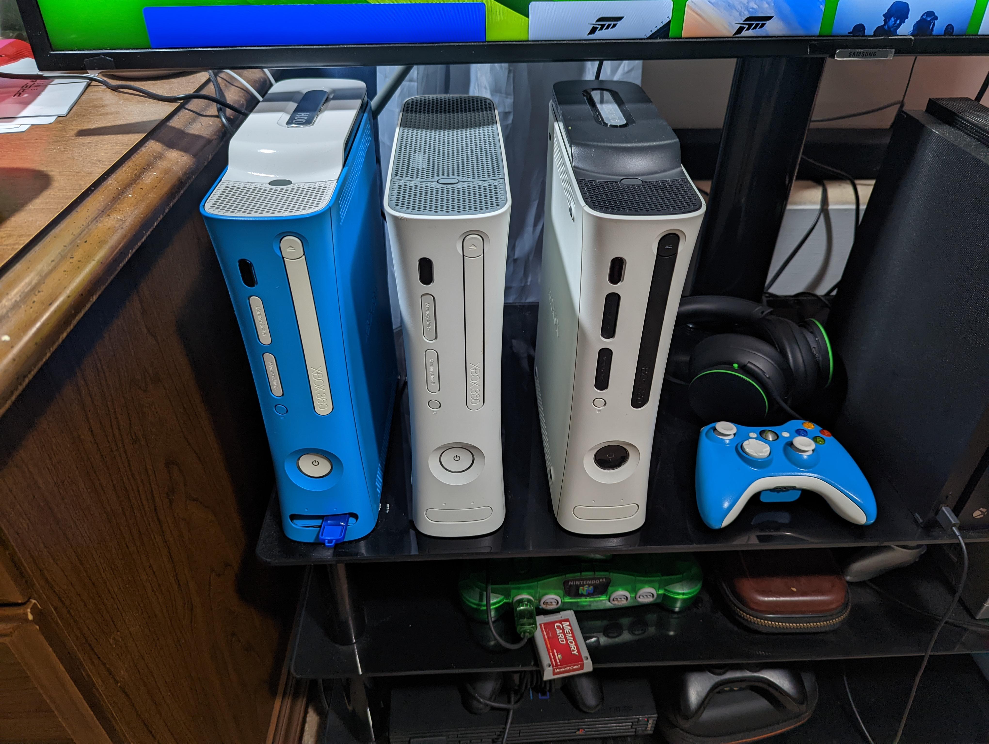 My Collection of Xbox 360s, Two of which were painted by me r/xbox360