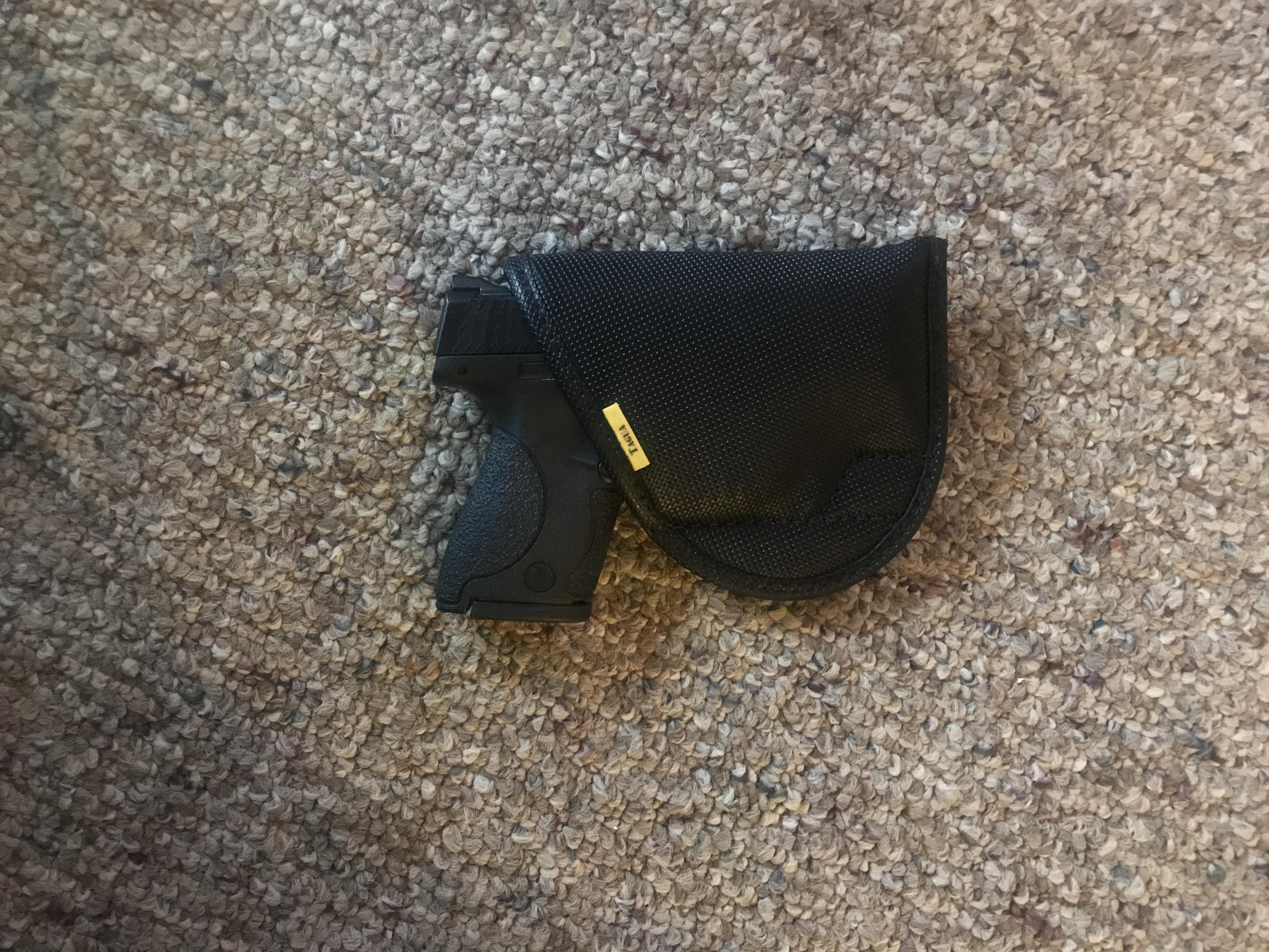 Got a pocket holster (Brand is TAGUA) for Mnp shield 9mm to carry while