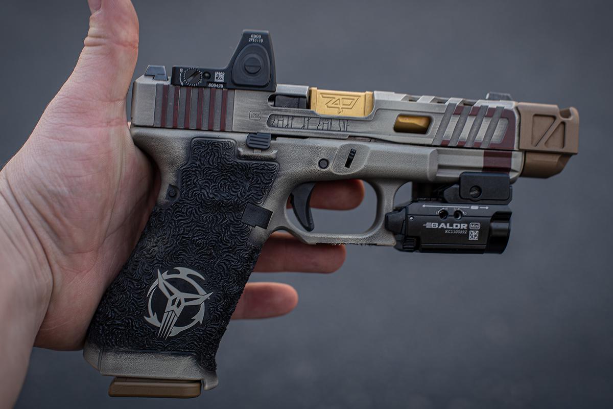 Glock 19x Mandalorian custom job. r/guns