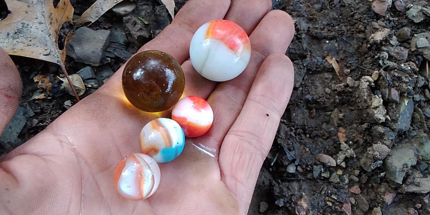 I dug these marbles yesterday in an old dump. I think all are Marble