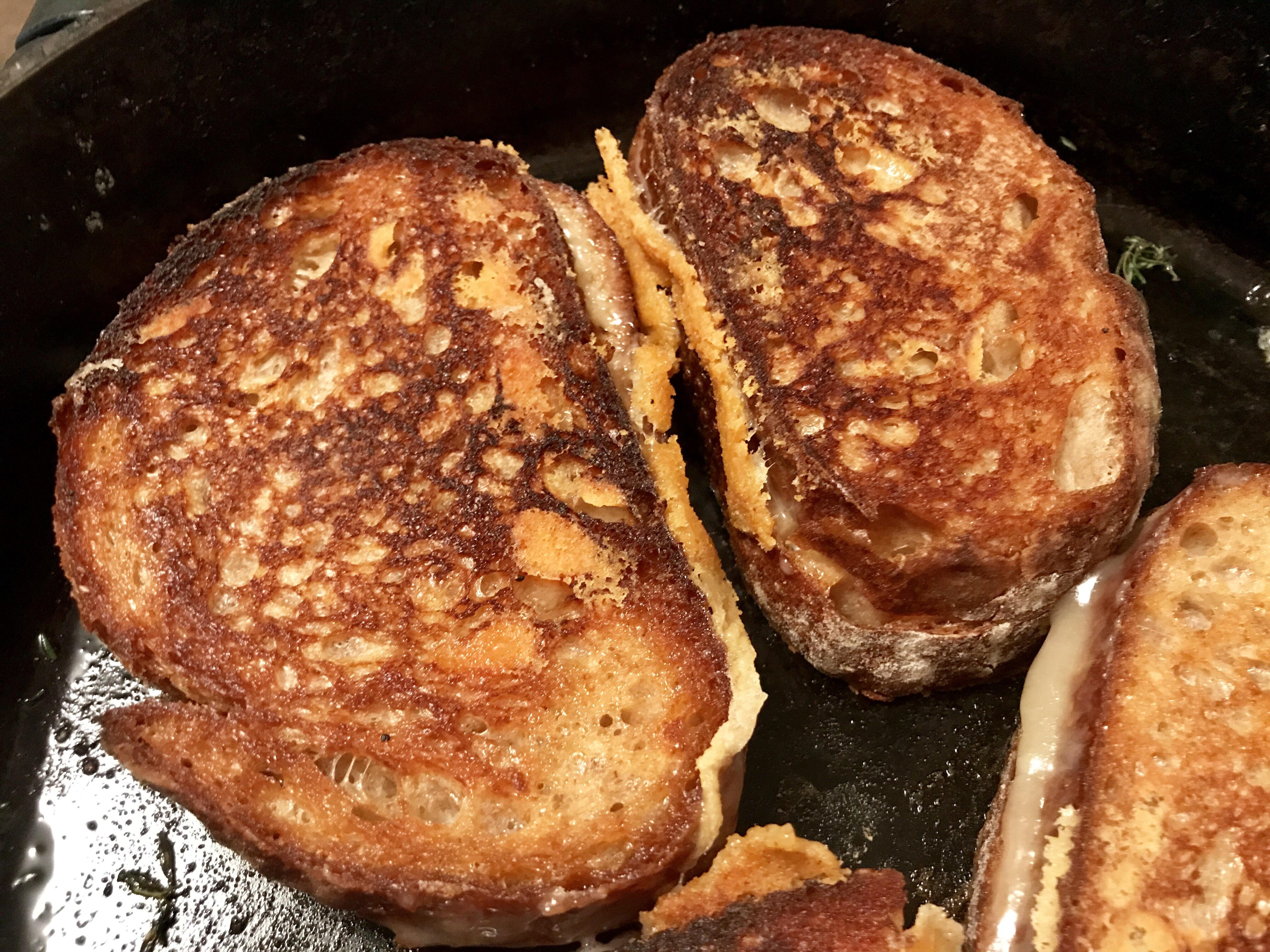 Simple cheddar on sourdough fried in butter in a cast iron pan. r