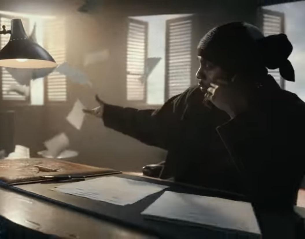 In the Super Bowl Halftime Announcement, Kendrick Lamar is seen writing