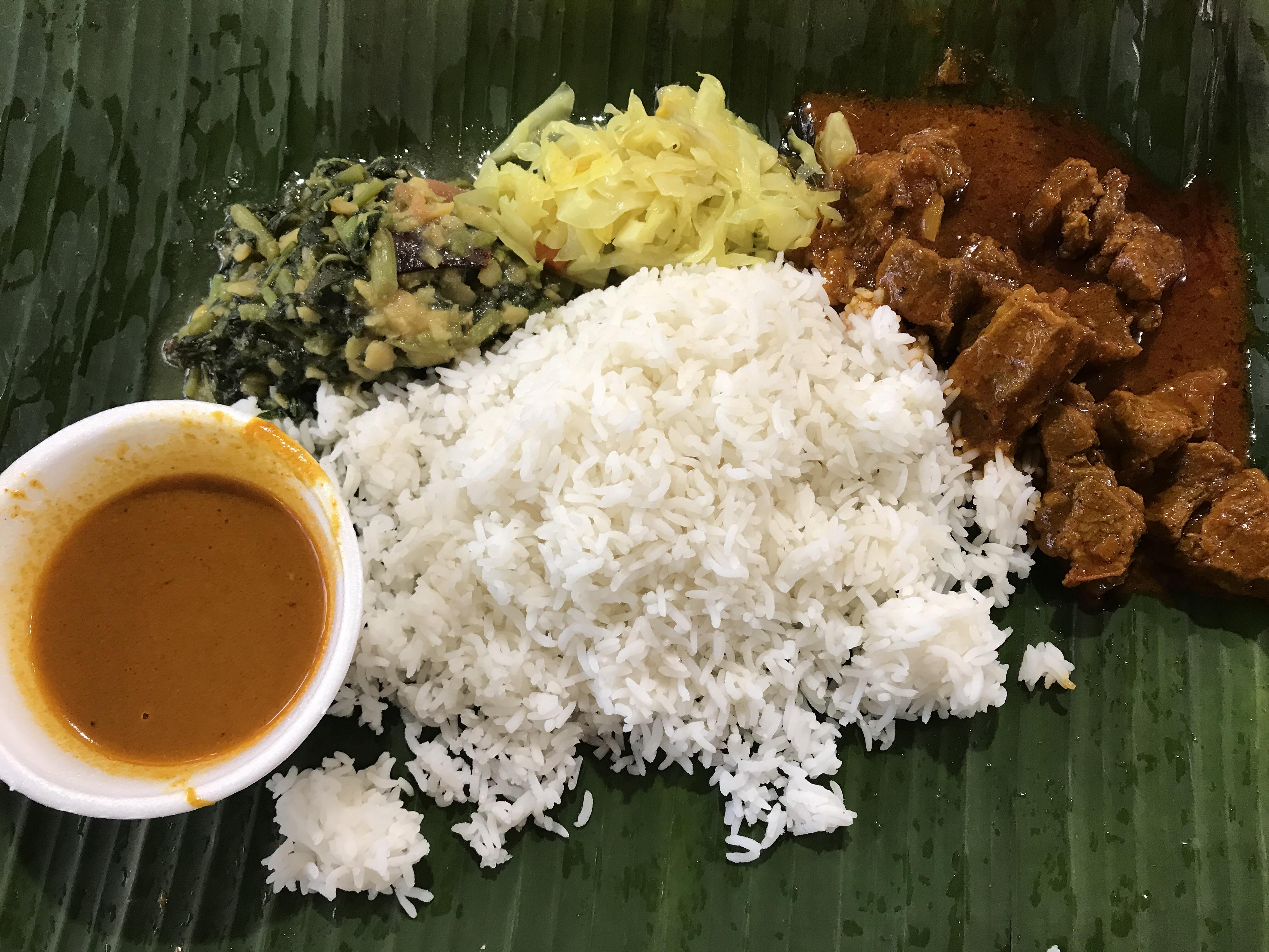 [I ate] mutton masala on a banana leaf in Singapore. r/FoodPorn