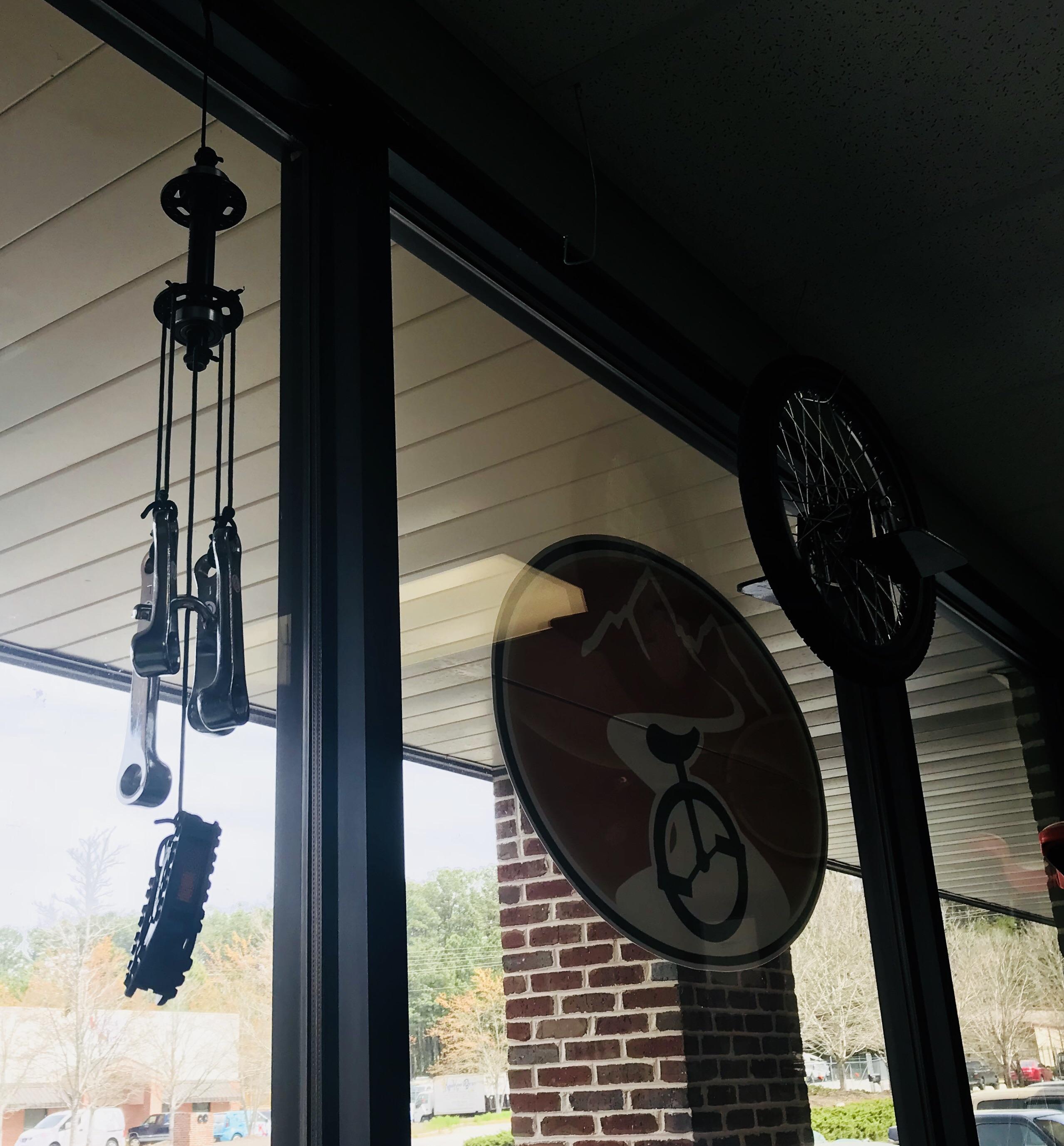 Our local unicycle shop has a wind chime made of old bits of unicycles