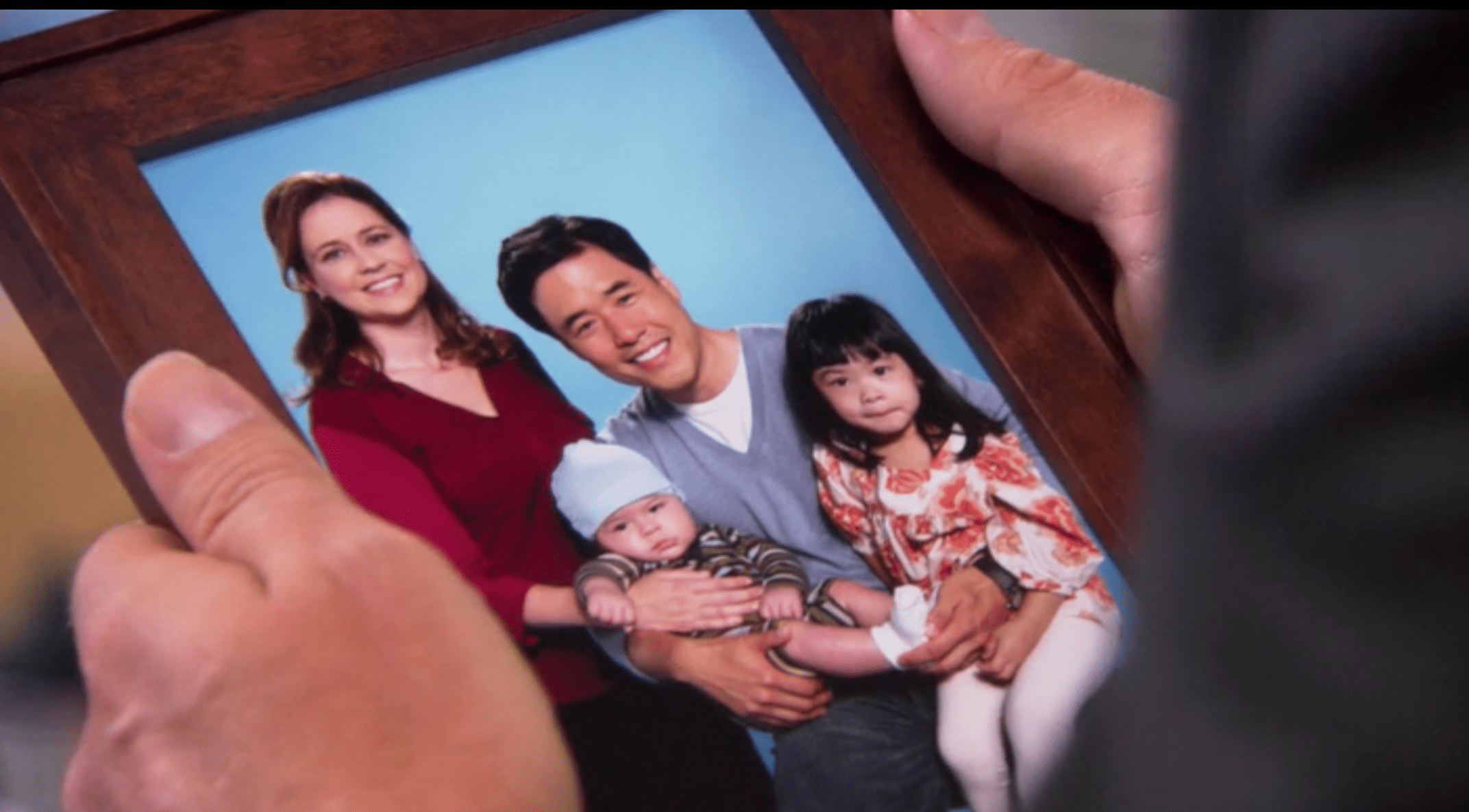 In Pam and Asian Jim's family portrait, Cece is Asian r/DunderMifflin