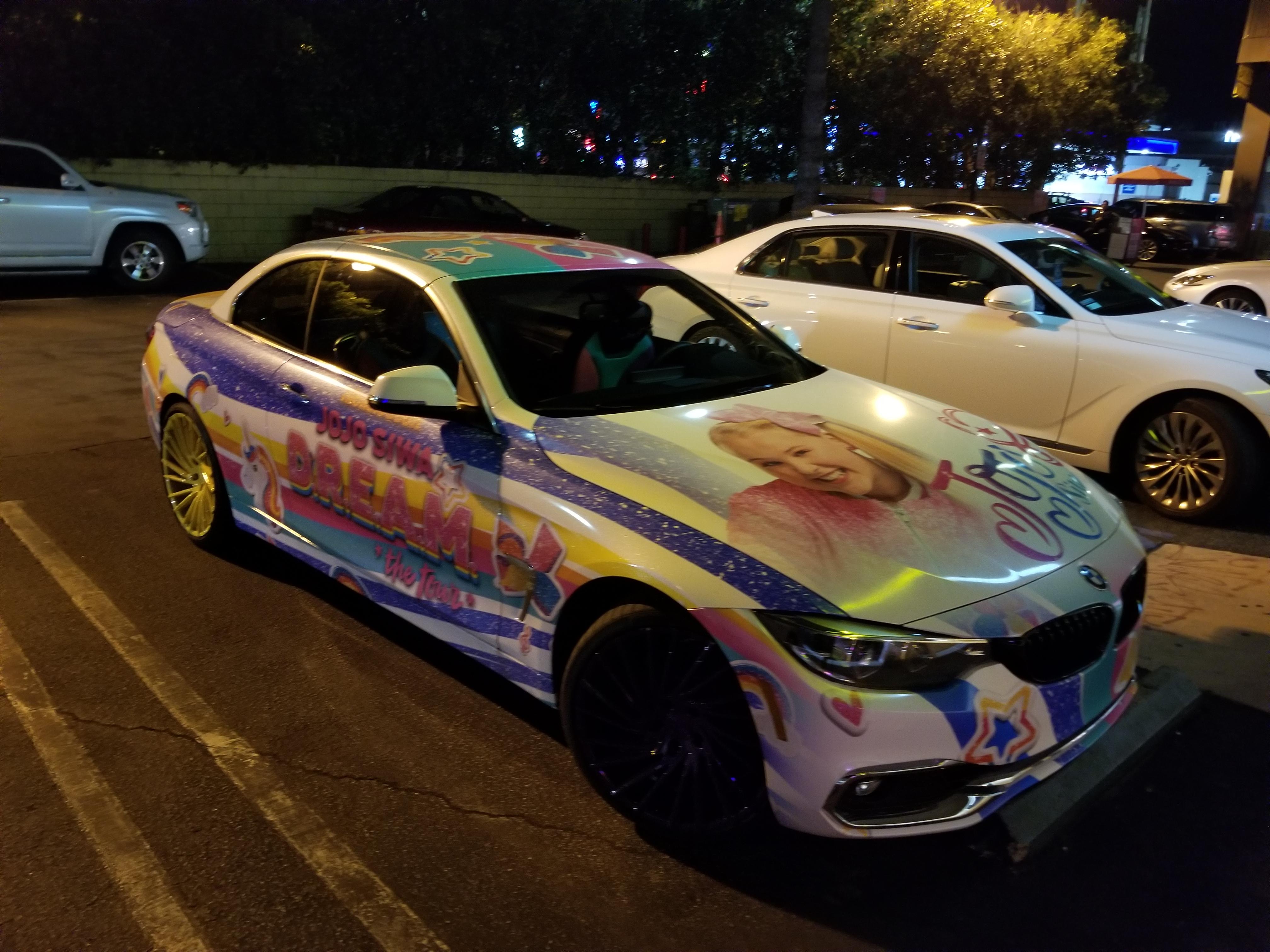 Jojo Siwa wrap. Wow. Just terrible. Who plasters their car with