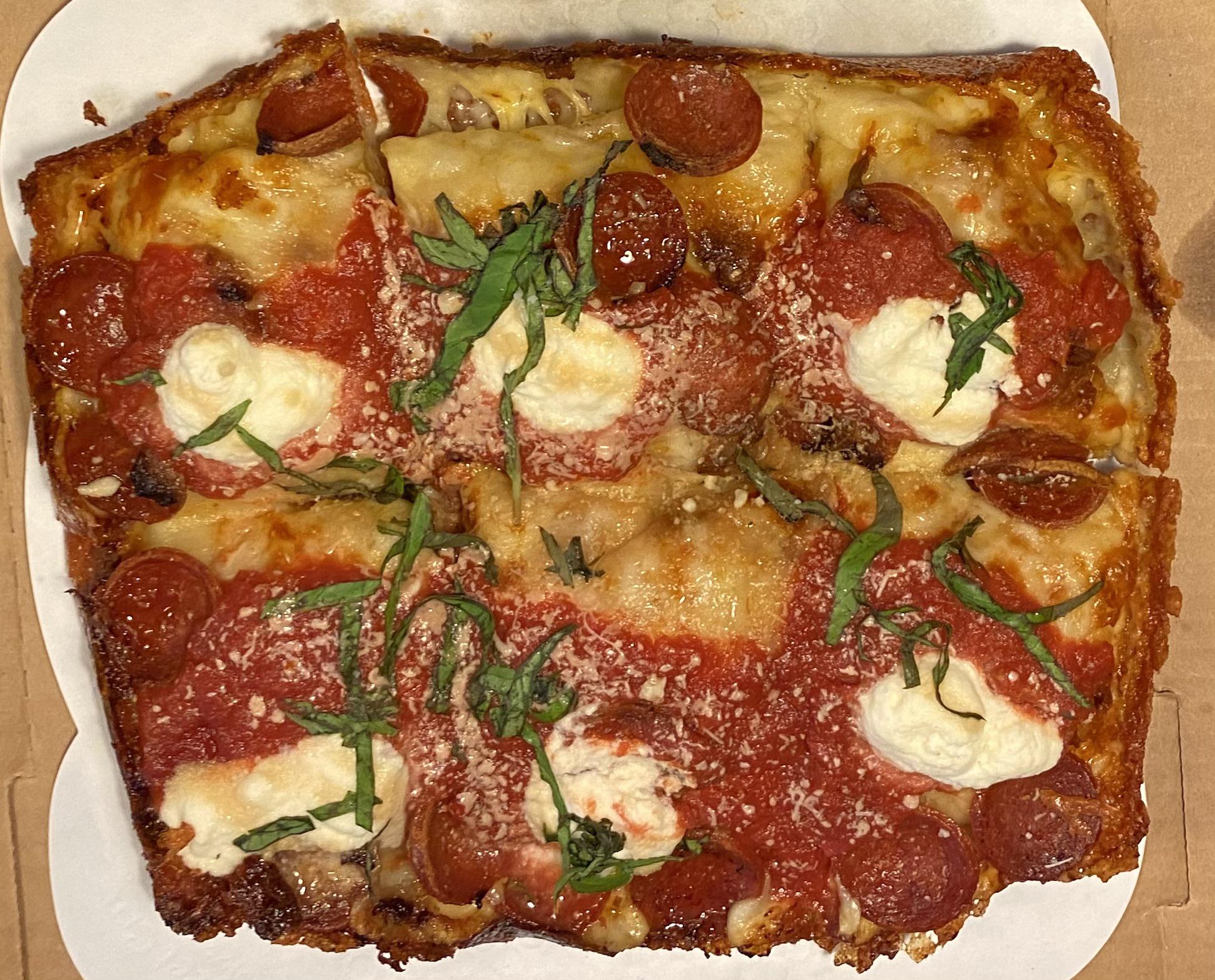 [I ate] Pizza made with Sharp White Cheddar, Mozzarella, Ezzo Pepperoni