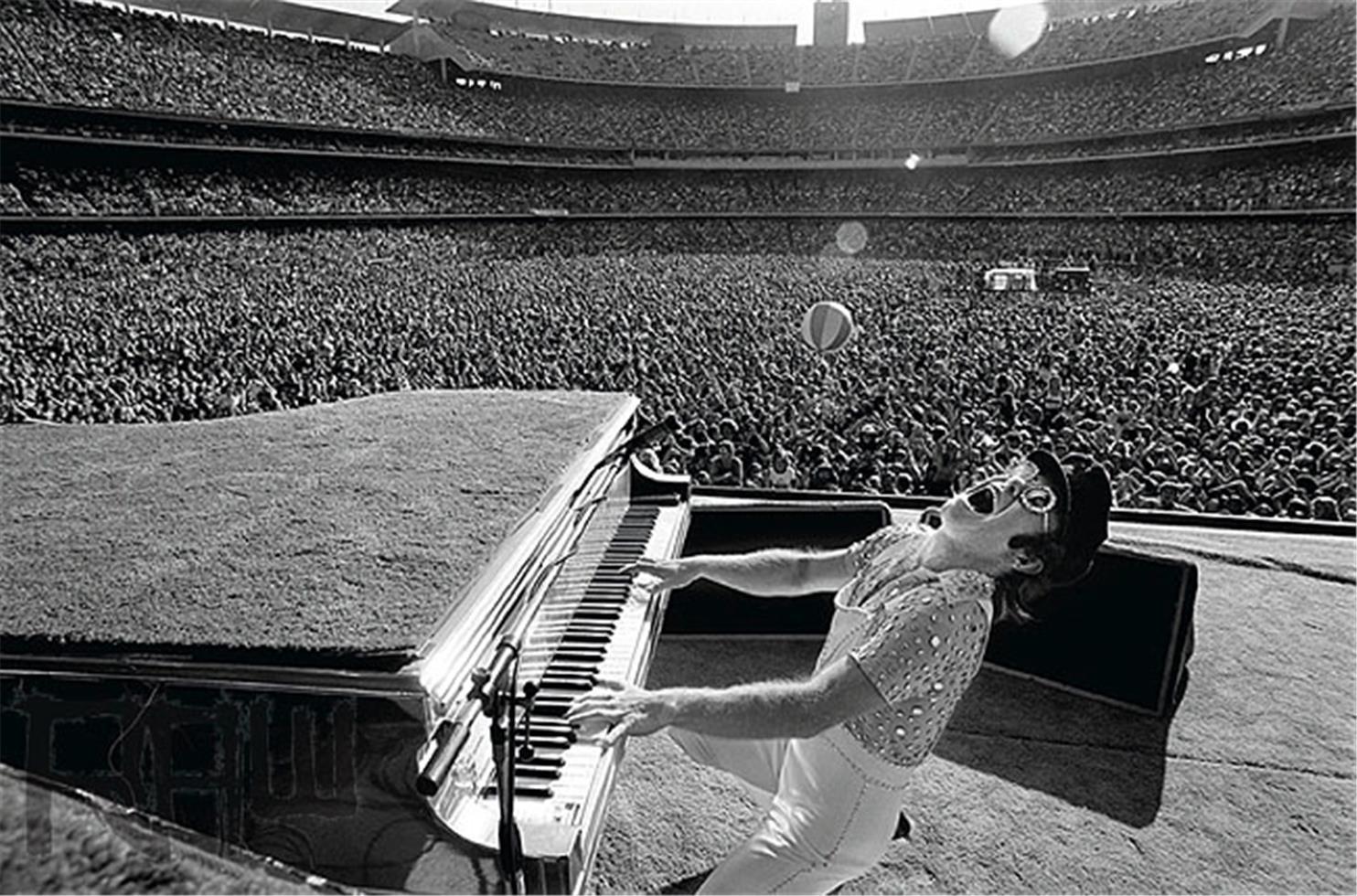 Elton John playing at a sold out Dodger Stadium in Los Angeles, CA in