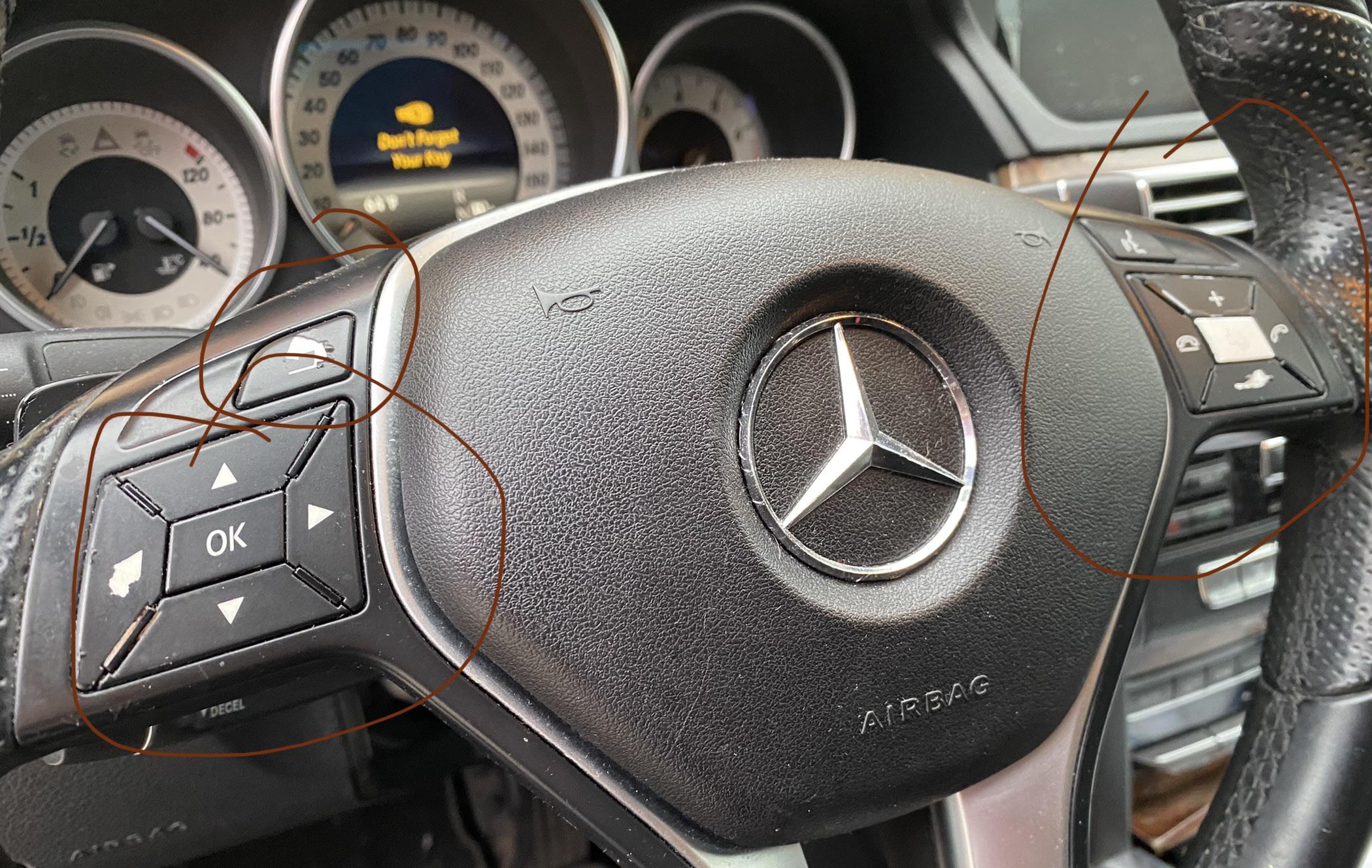 2014 MB E350 steering wheel and entertainment buttons peeling. r